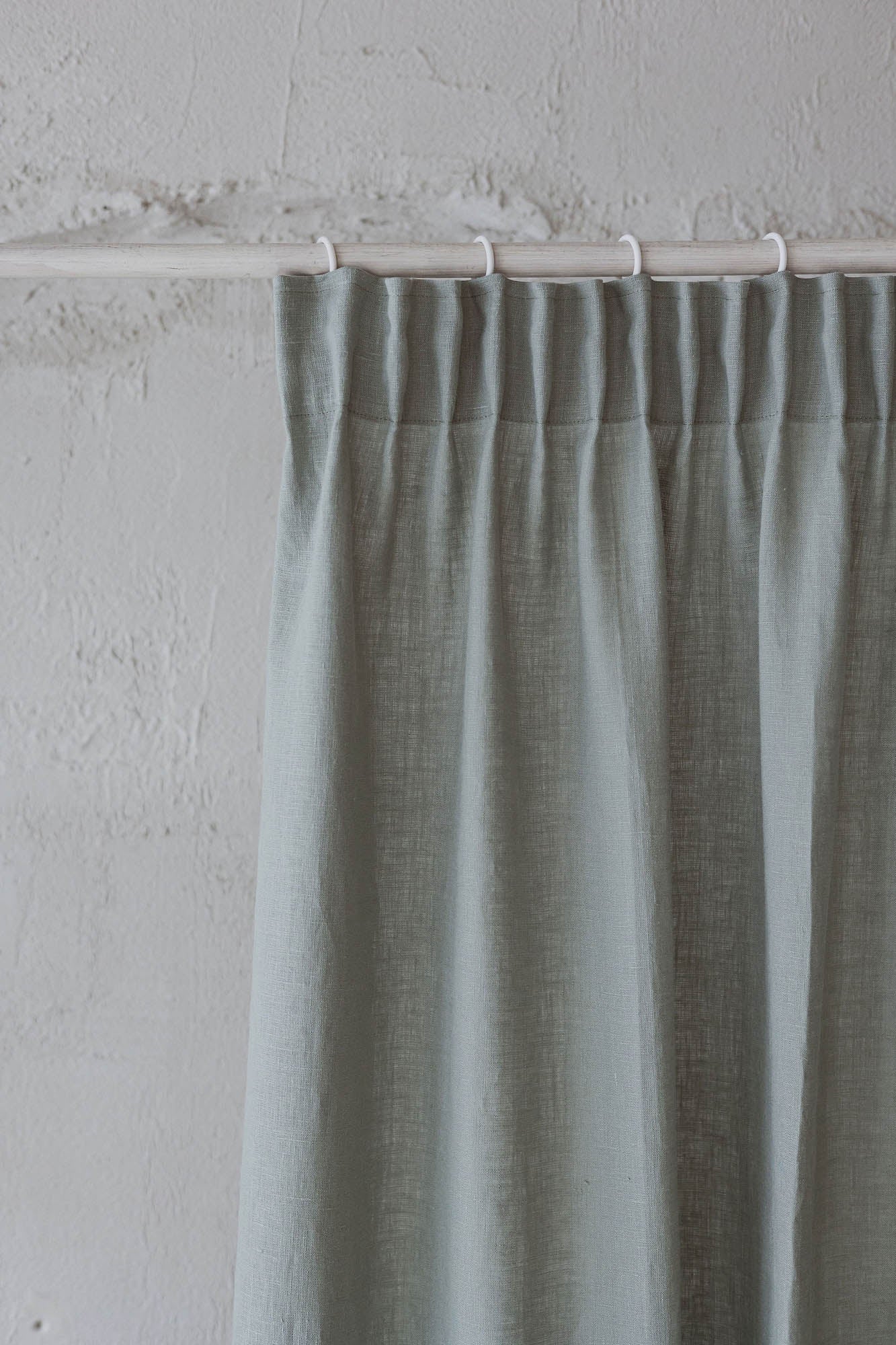 Pencil pleat linen curtain in frosty green