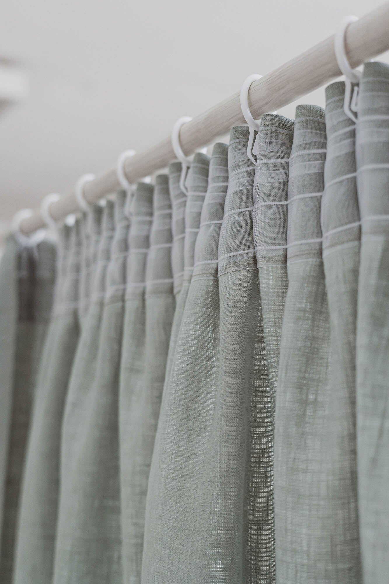 Pencil pleat linen curtain in frosty green