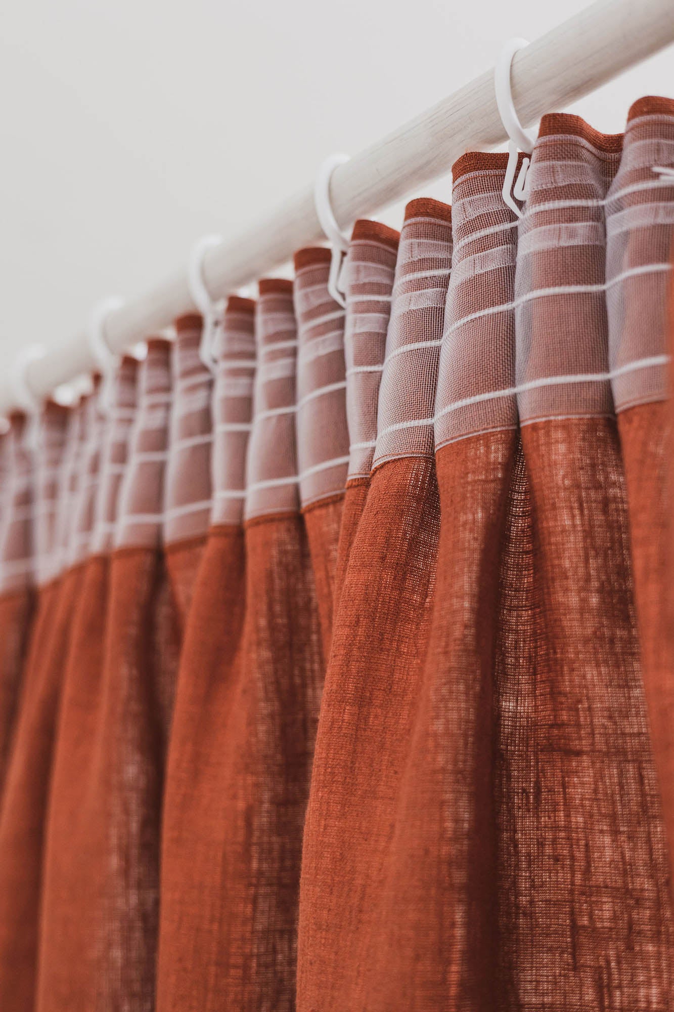 Pencil pleat linen curtain in burnt orange
