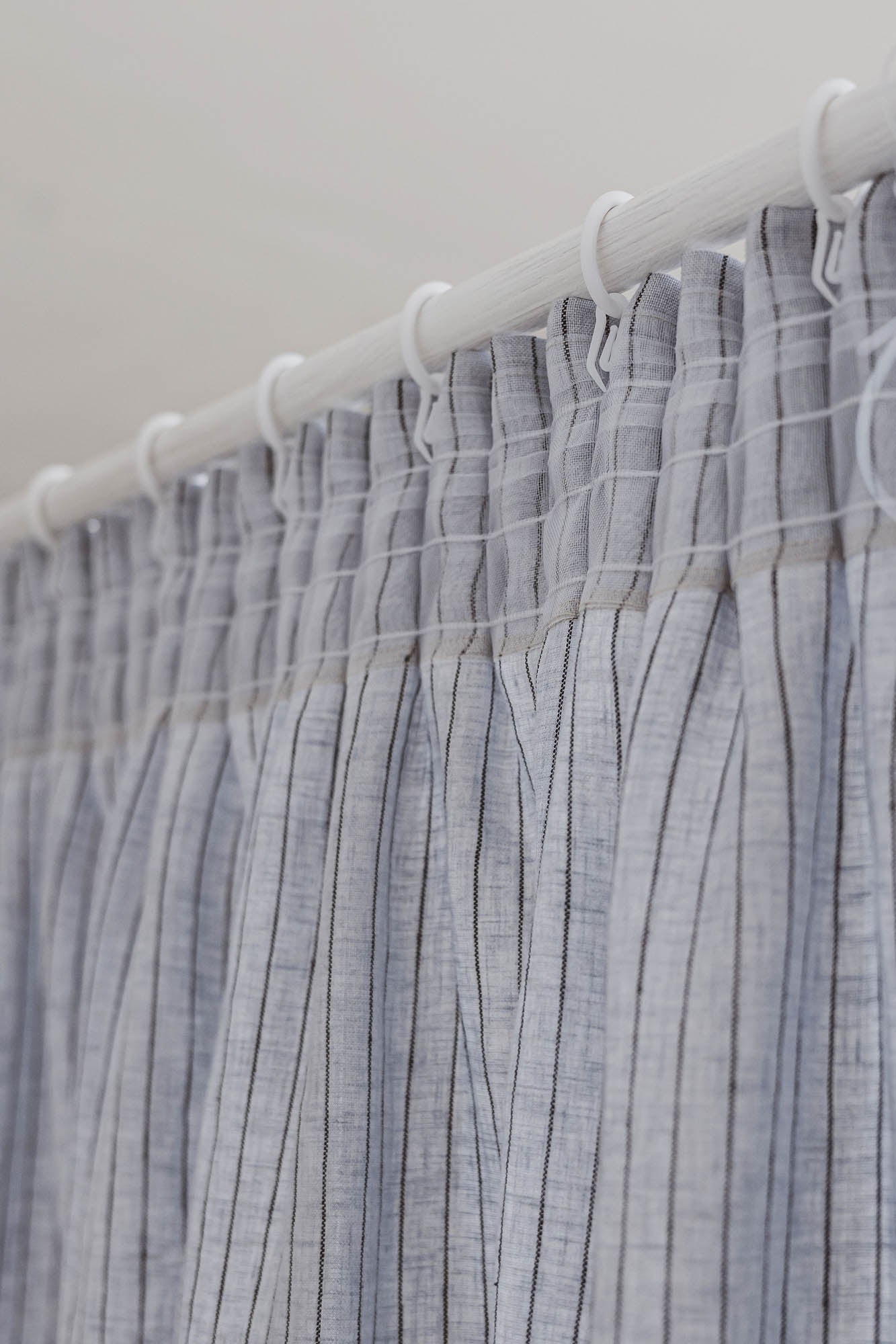 Pencil pleat linen curtain in grey with black stripes