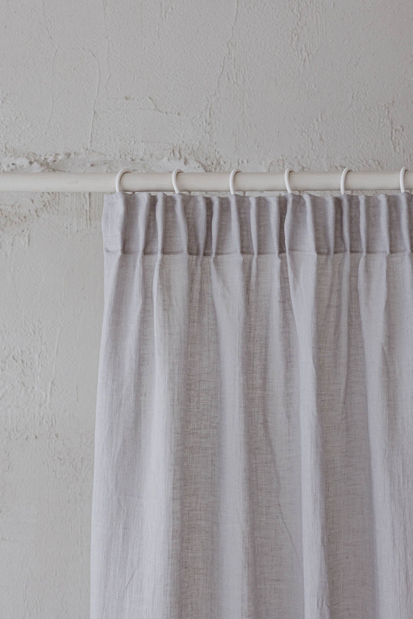 Sheer pencil pleat linen curtain in rainy day