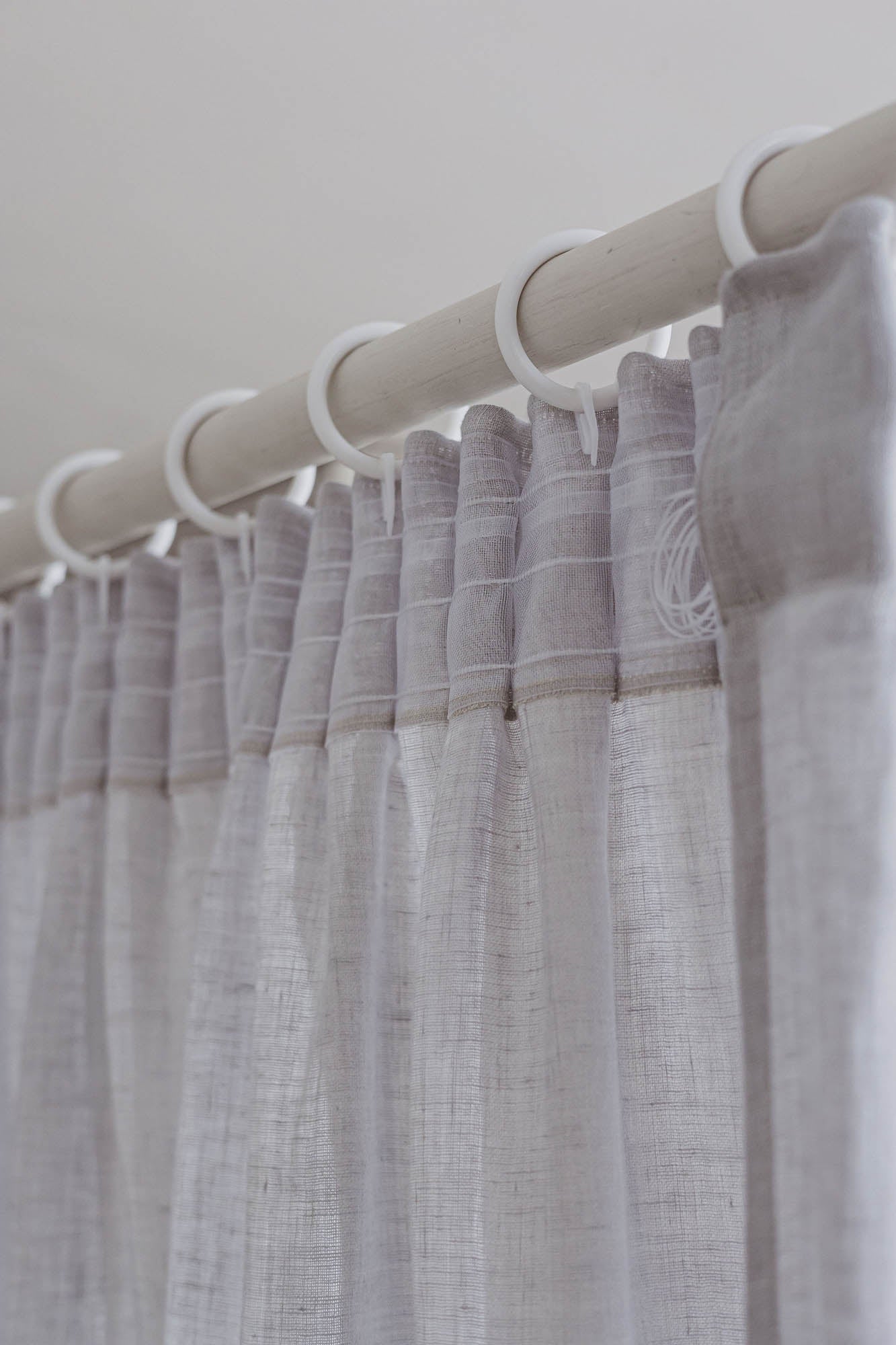 Sheer pencil pleat linen curtain in rainy day