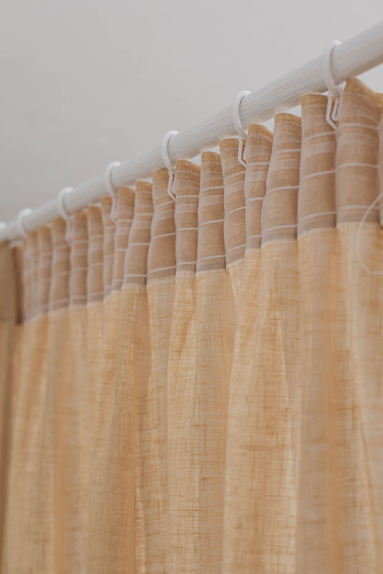 Sheer pencil pleat linen curtain in wheat