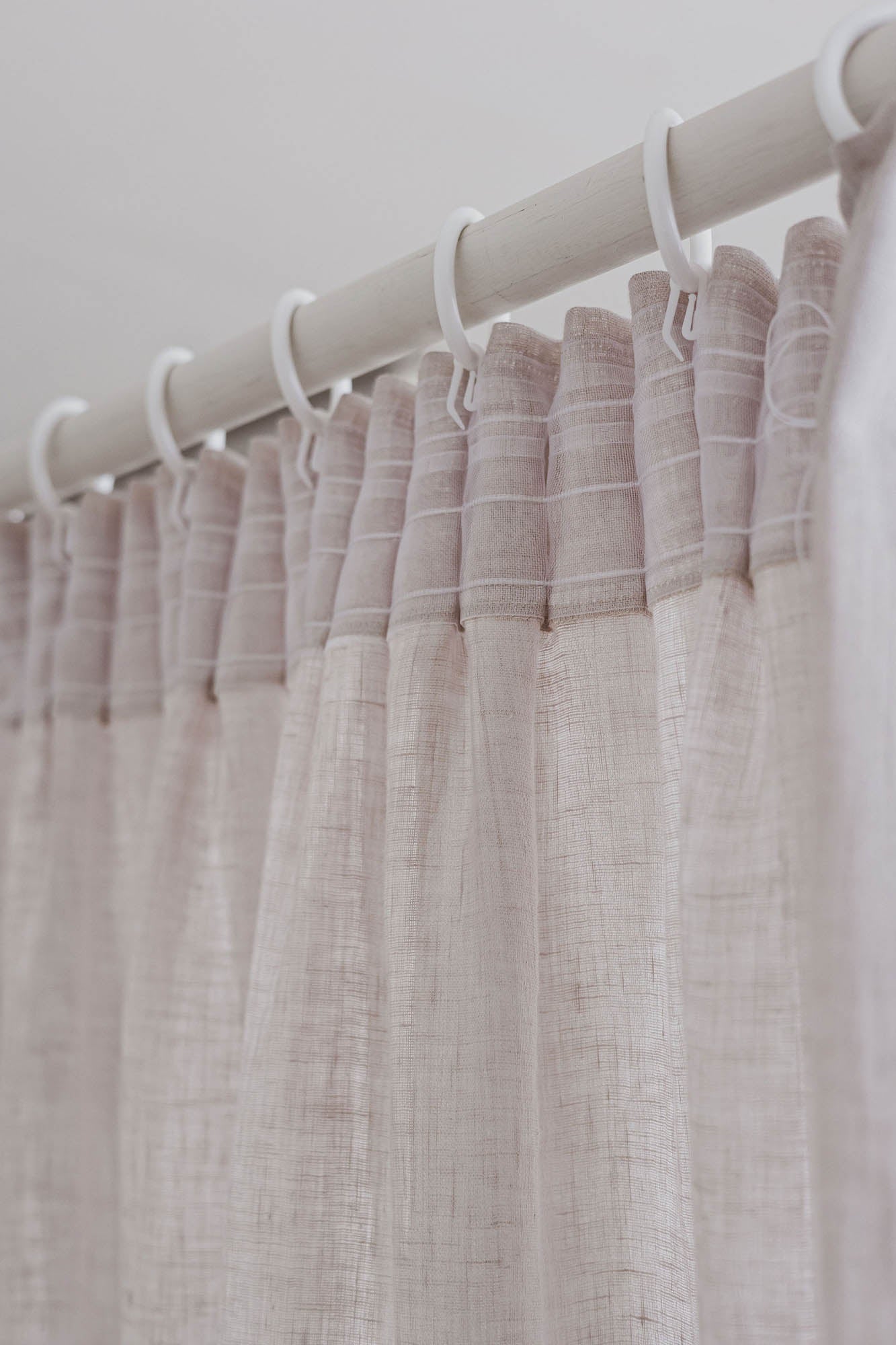 Sheer pencil pleat linen curtain in white sand
