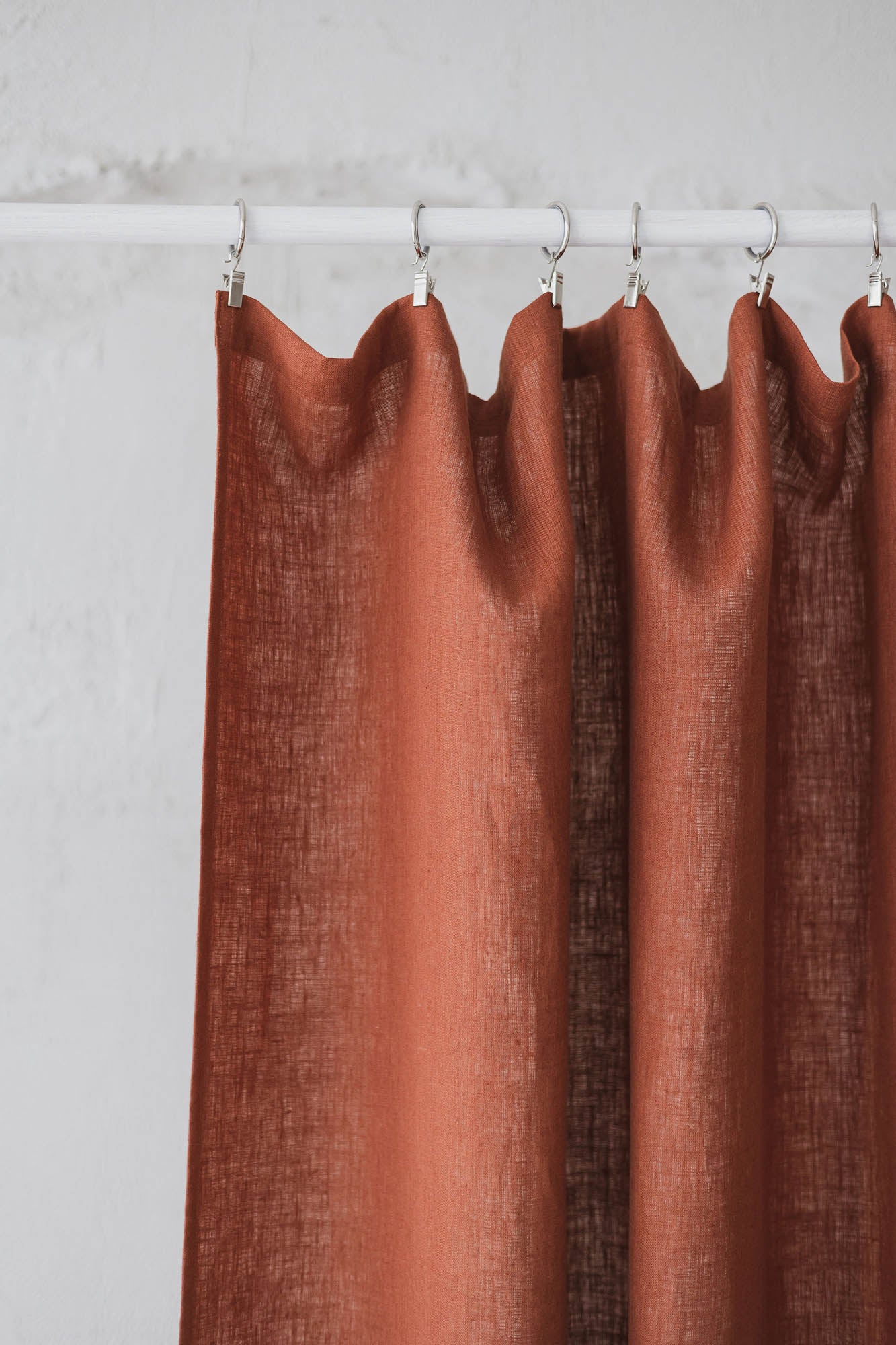 Burnt orange linen curtain with simple hem, for clips