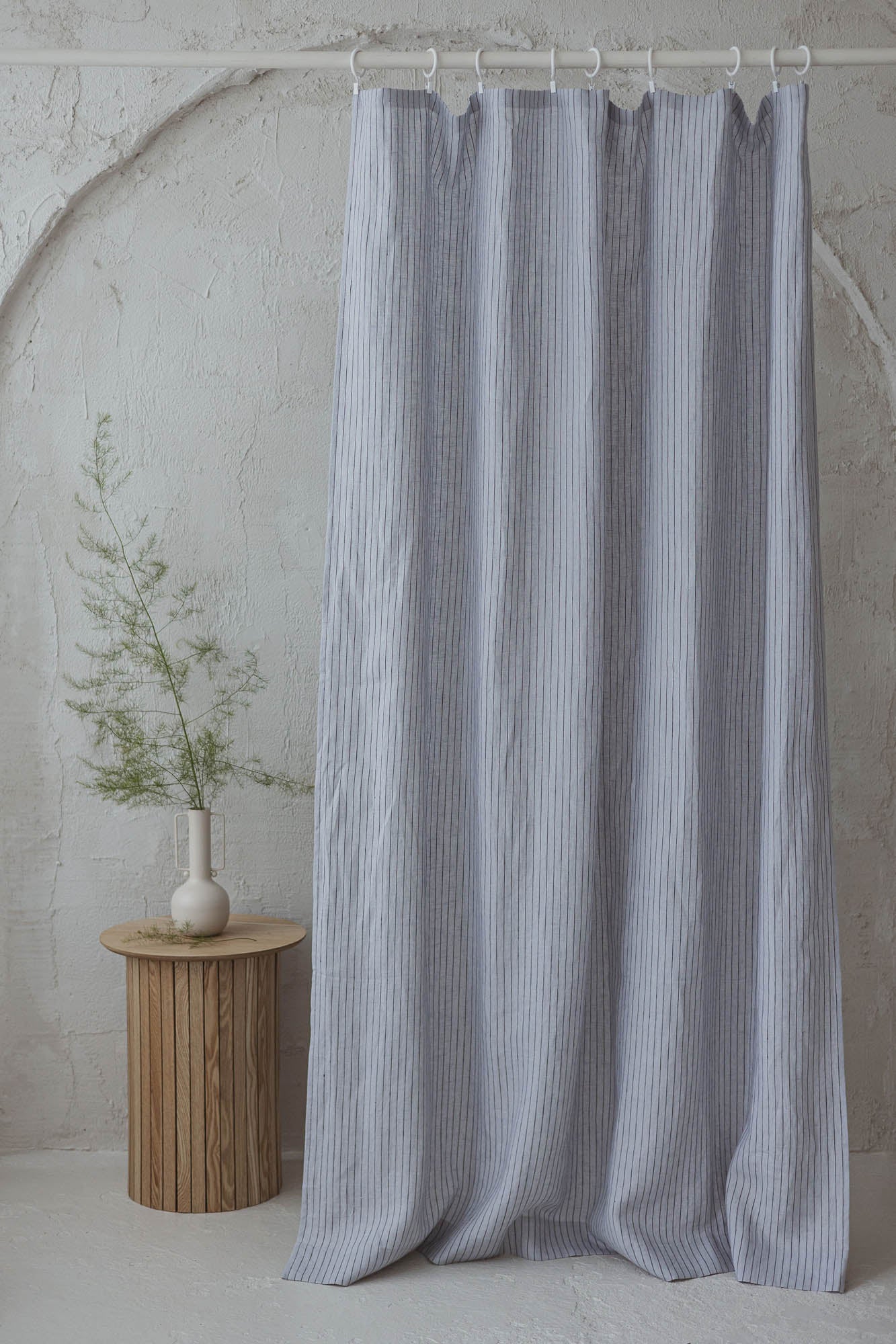 Grey linen curtain with black stripes and simple hem, for clips