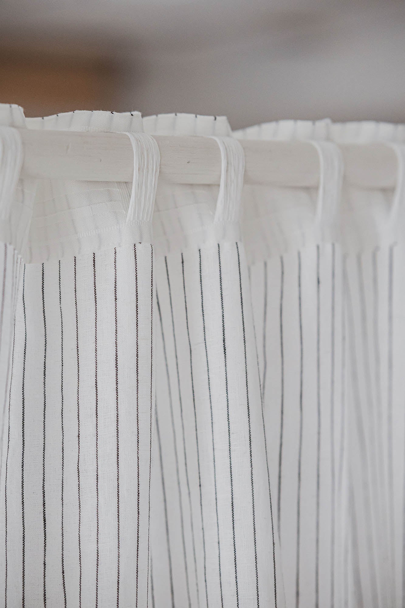 White and black striped linen curtain with multifunctional heading tape