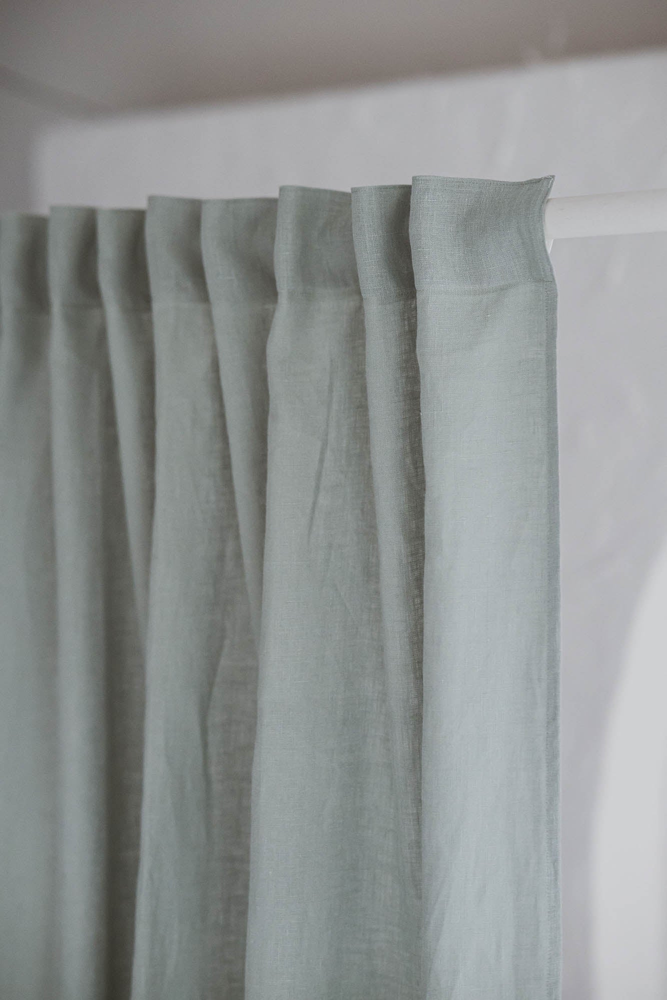 Frosty green linen curtain with multifunctional heading tape
