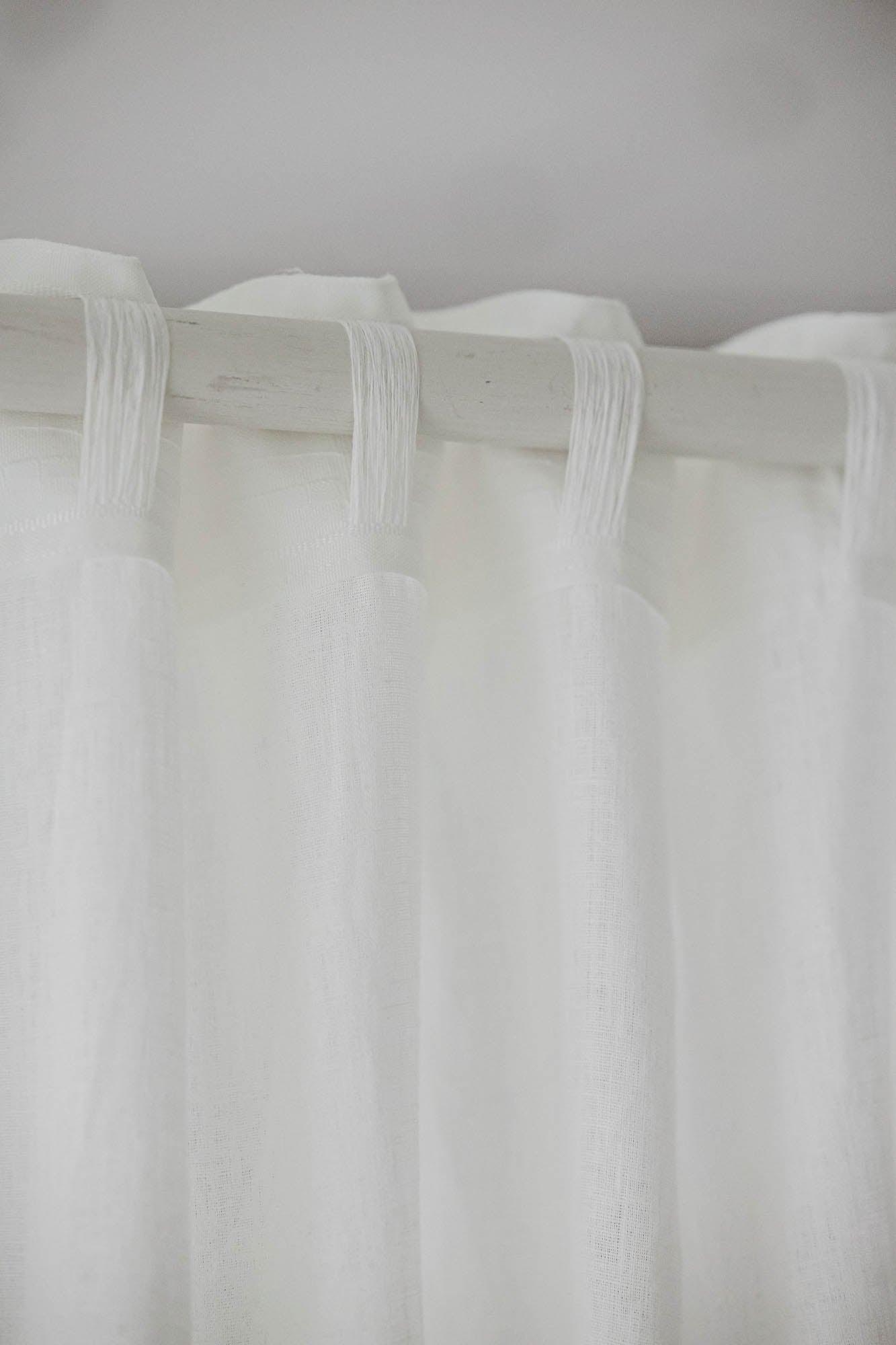 Off white linen curtain with multifunctional heading tape
