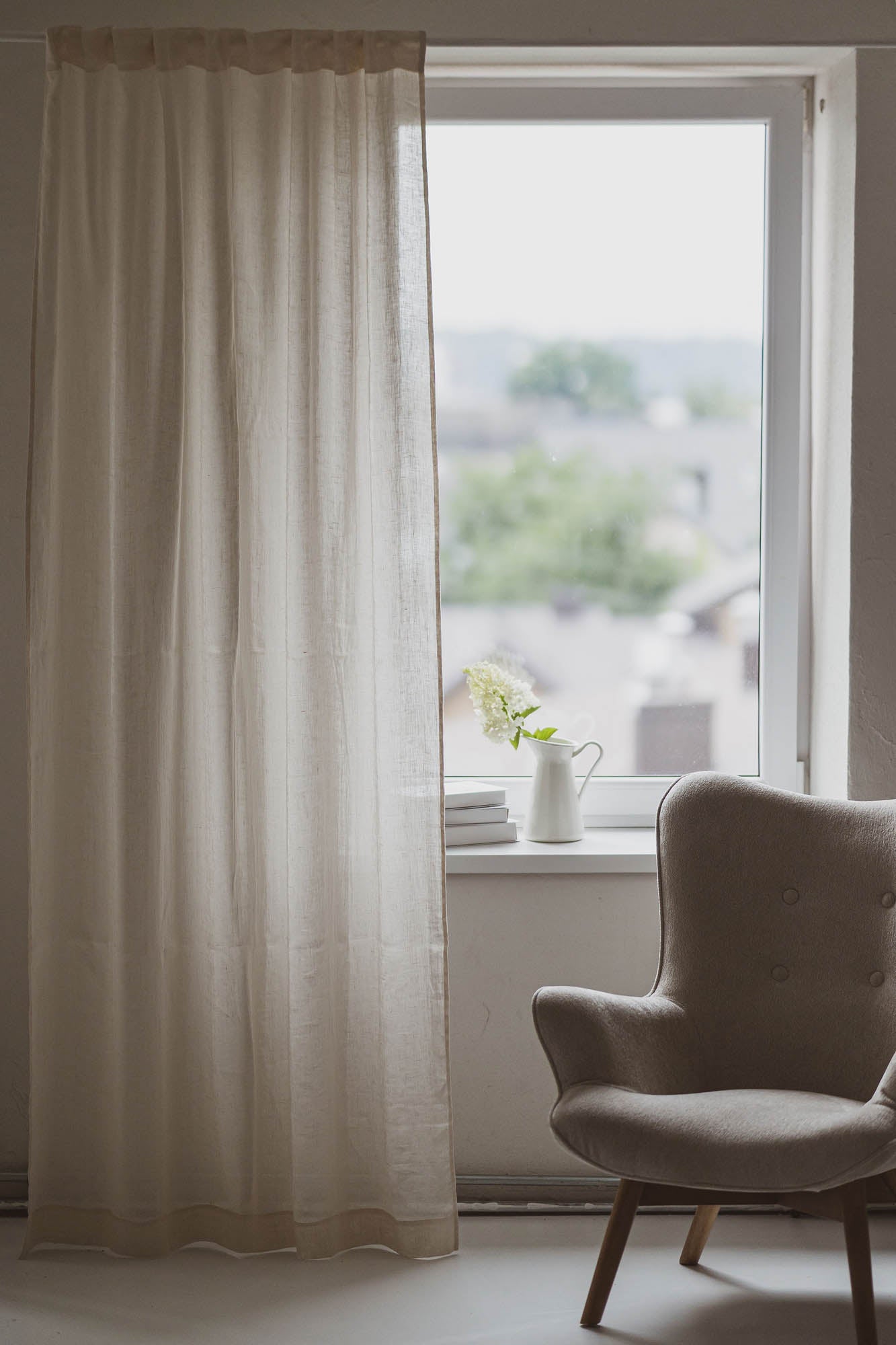 Light cream sheer linen curtain with multifunctional heading tape