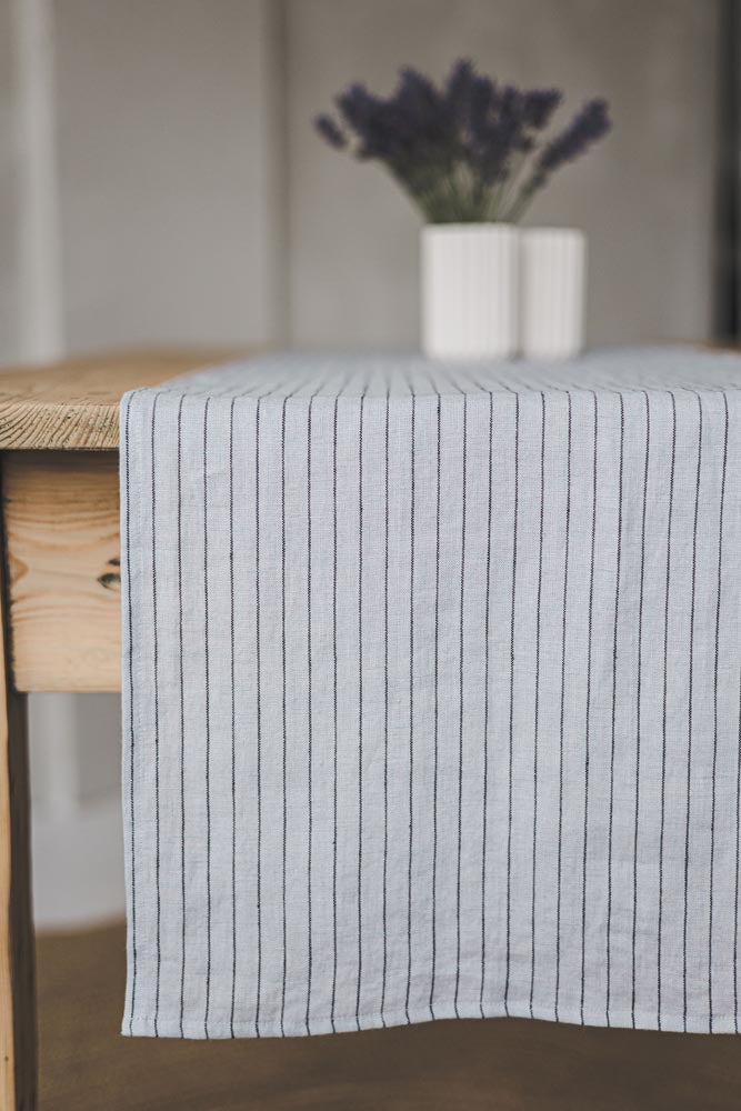 Grey linen table runner with black stripes