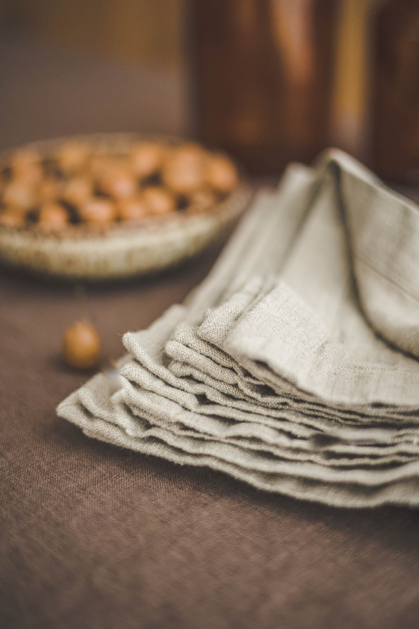 Natural linen napkins with mitered corners