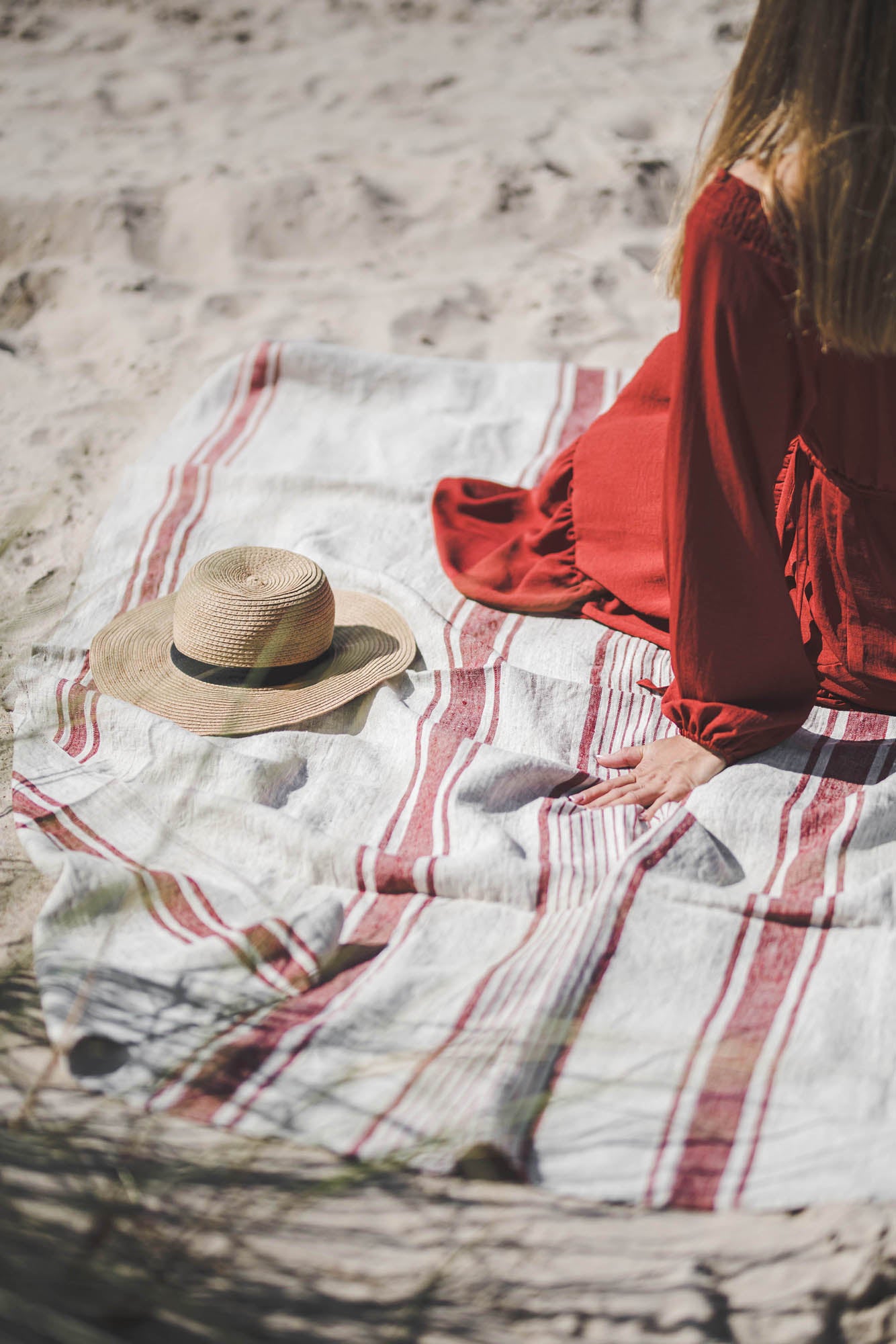 Linen beach towel with cherry red stripes