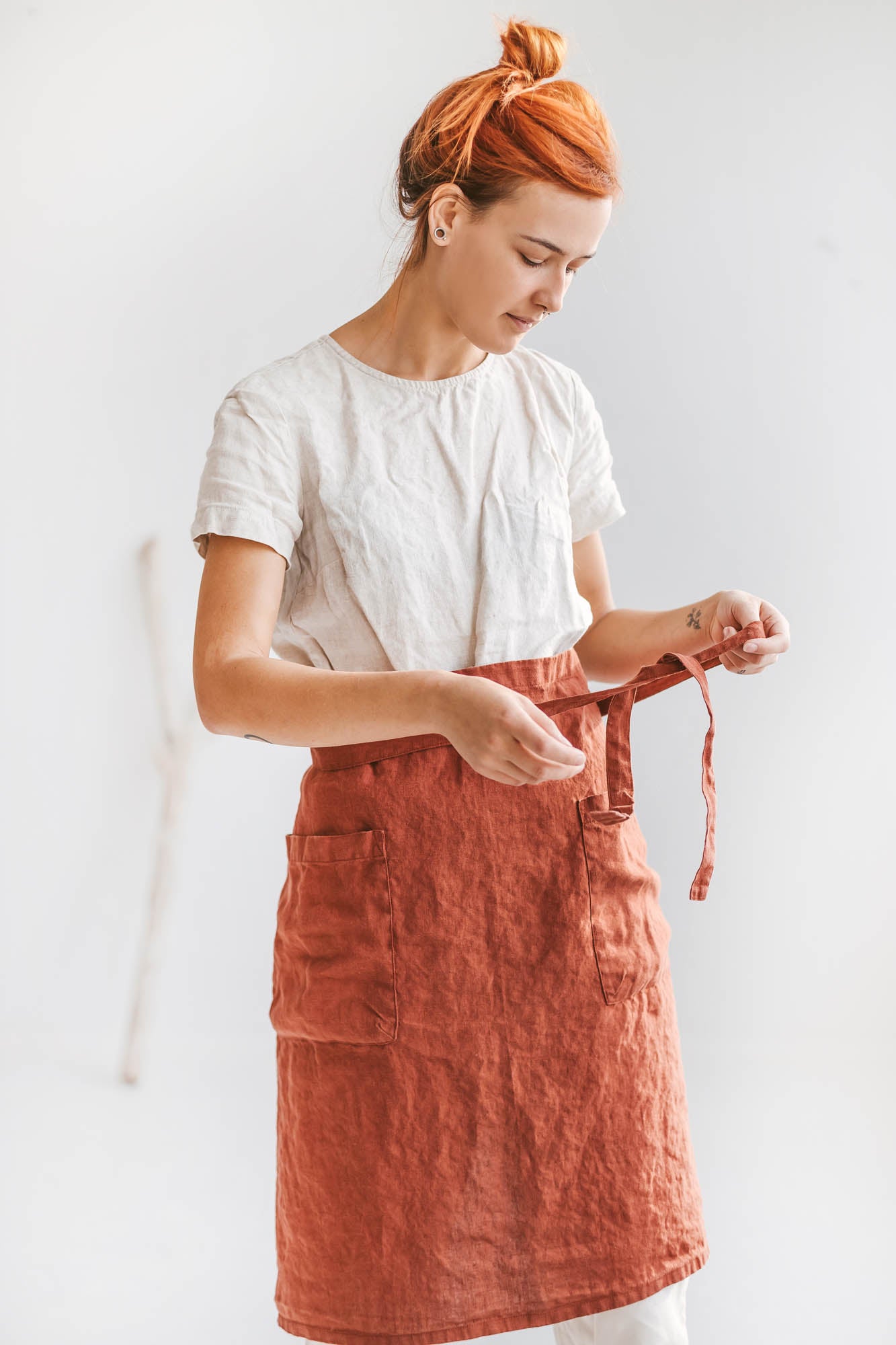 Burnt orange linen half apron