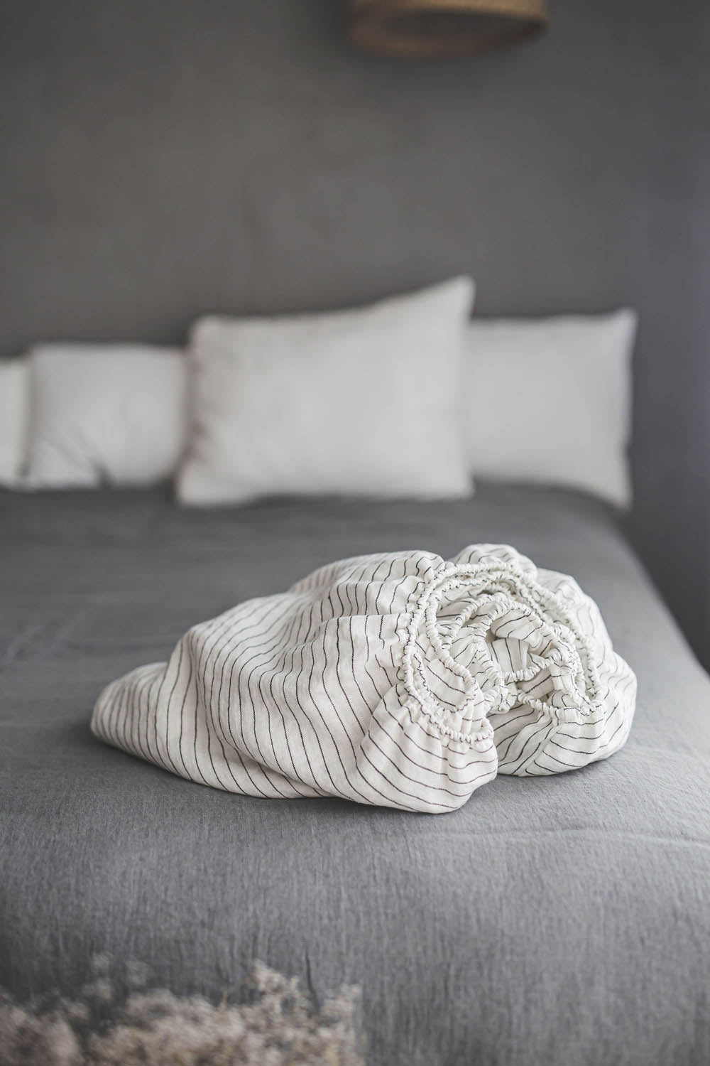 White linen fitted sheet with black stripes