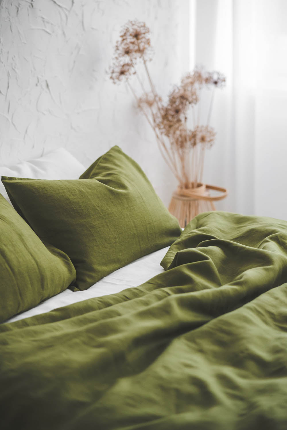 Moss green linen duvet cover with buttons