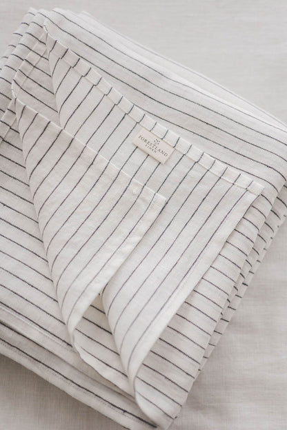 White linen flat sheet with black stripes