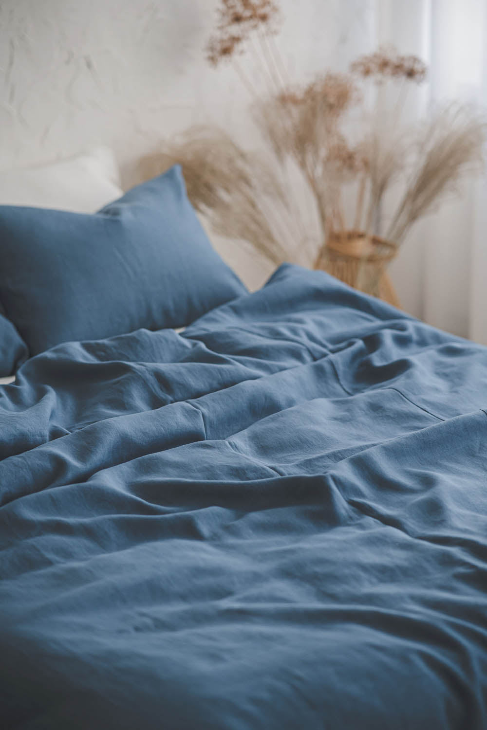 Cornflower blue linen duvet cover with buttons