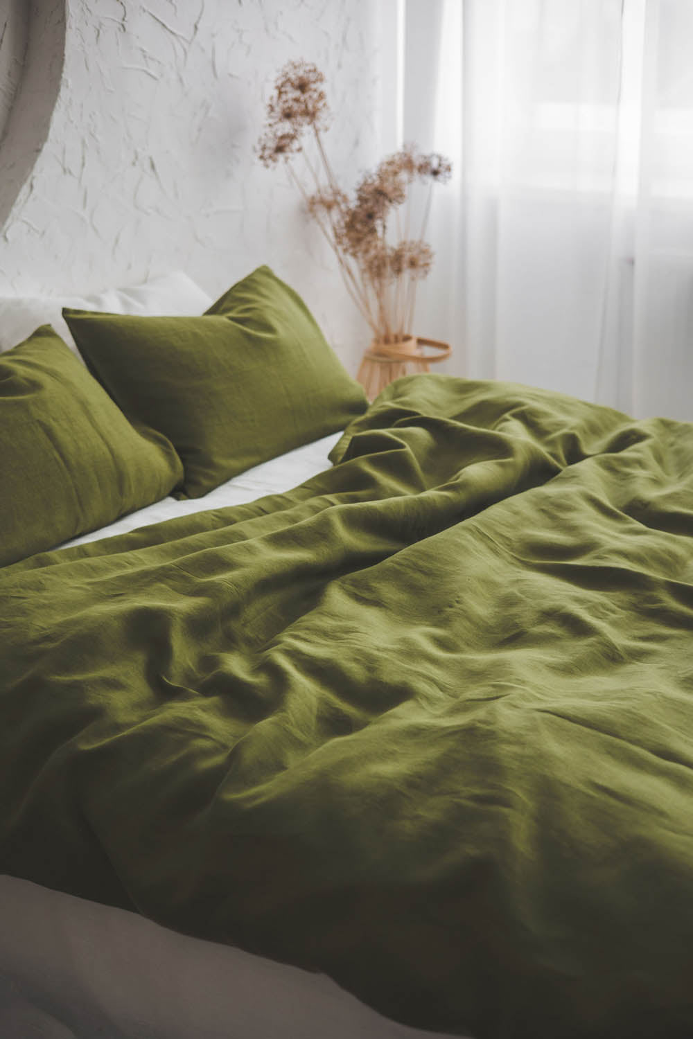 Moss green linen duvet cover with buttons