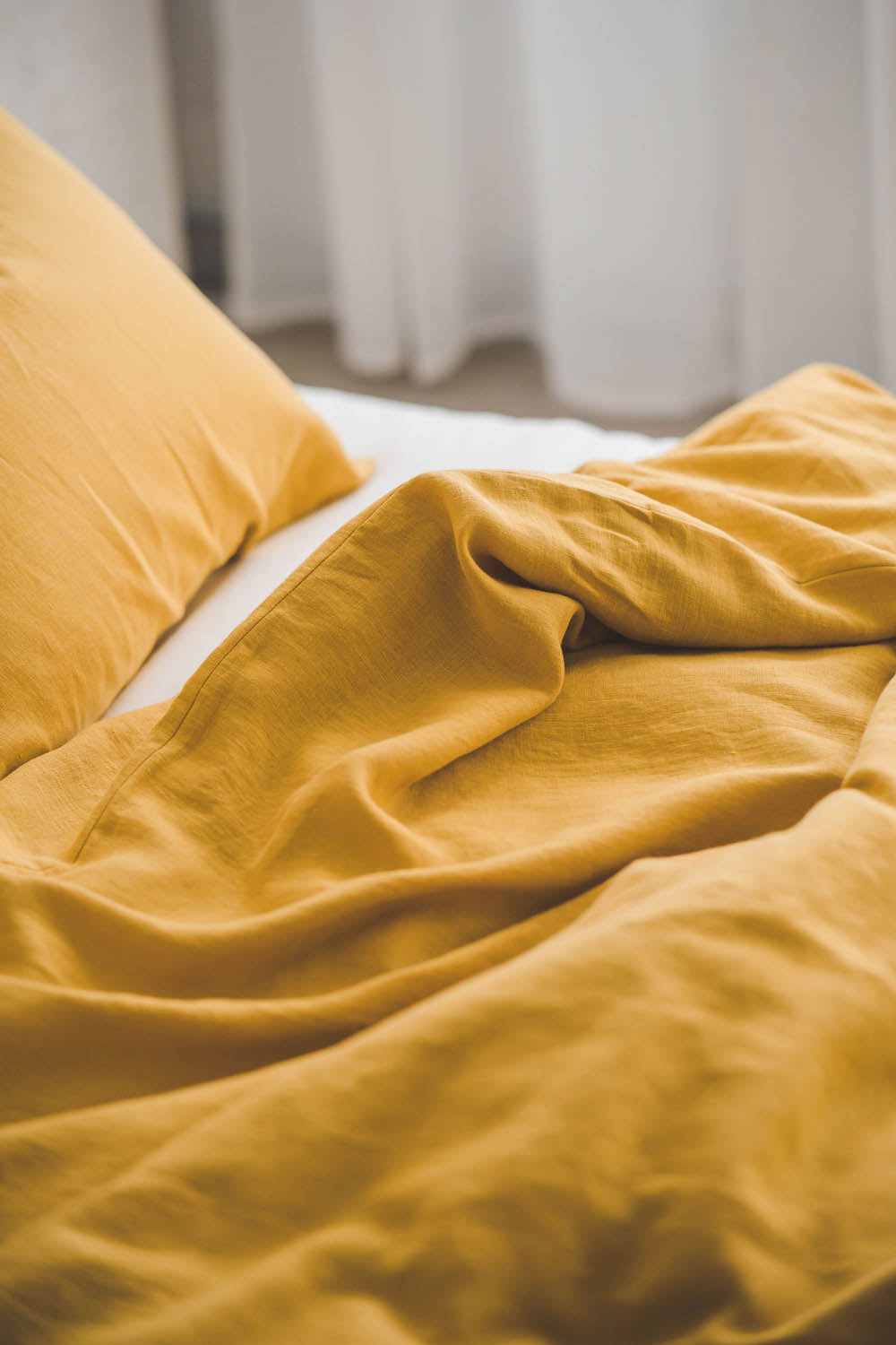 Mimosa yellow linen duvet cover with buttons