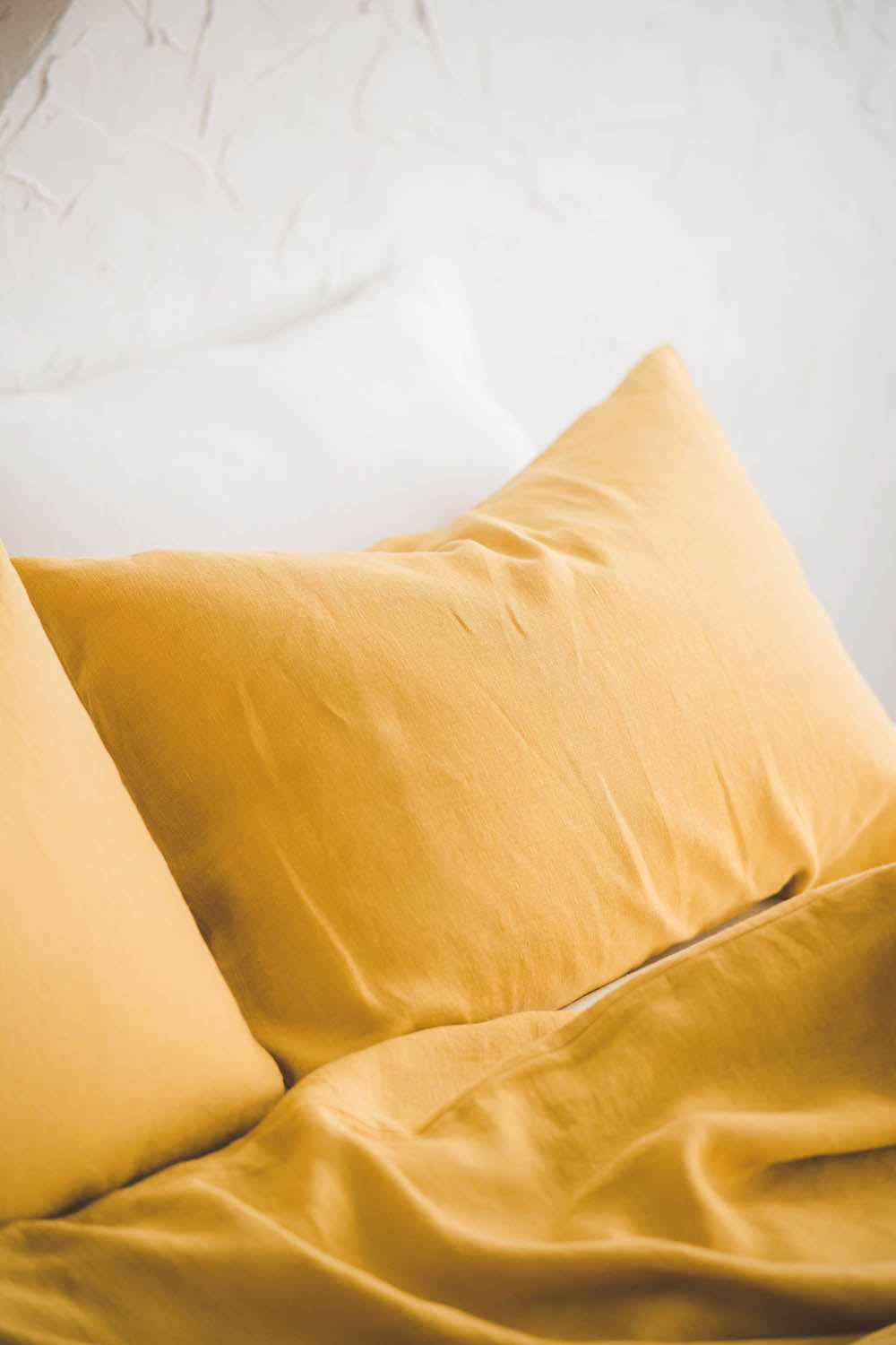 Mimosa yellow linen duvet cover with buttons