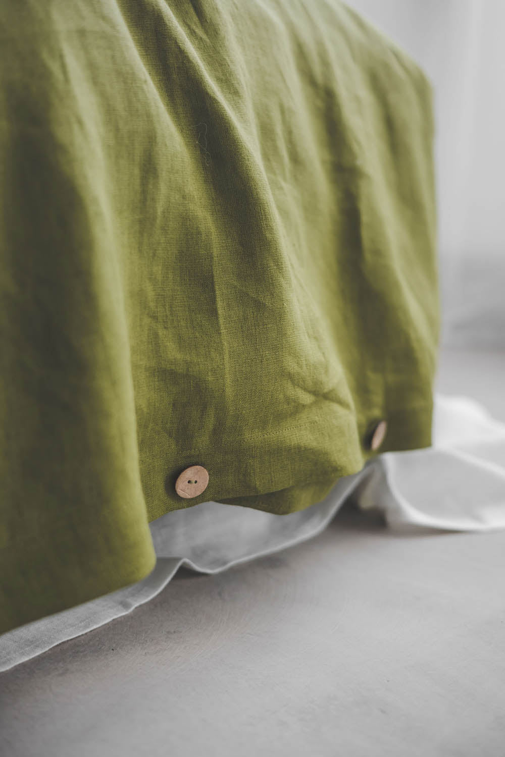 Moss green linen duvet cover with buttons