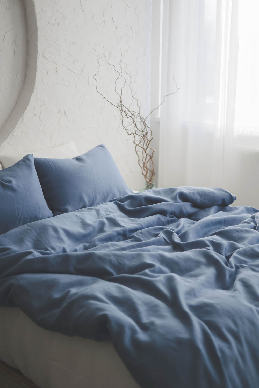 Denim blue linen duvet cover with buttons