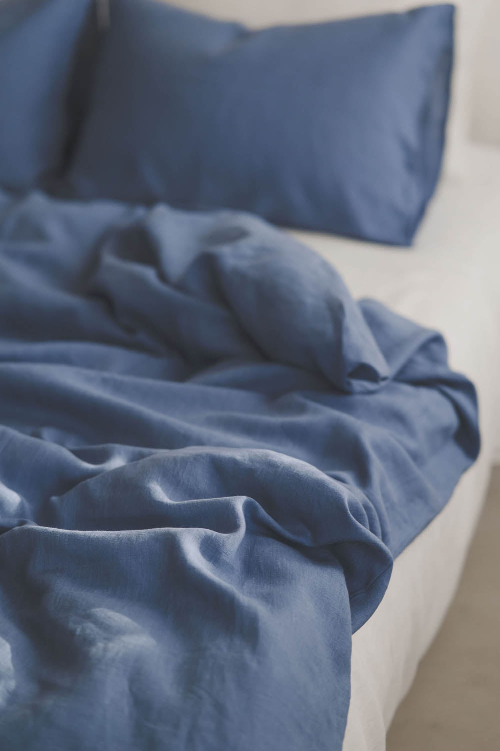 Denim blue linen duvet cover with buttons