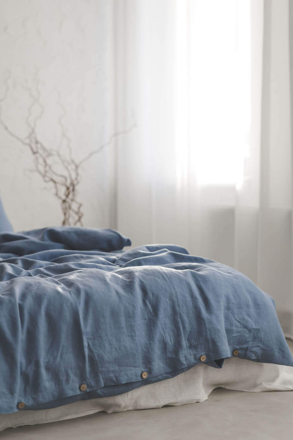 Denim blue linen duvet cover with buttons