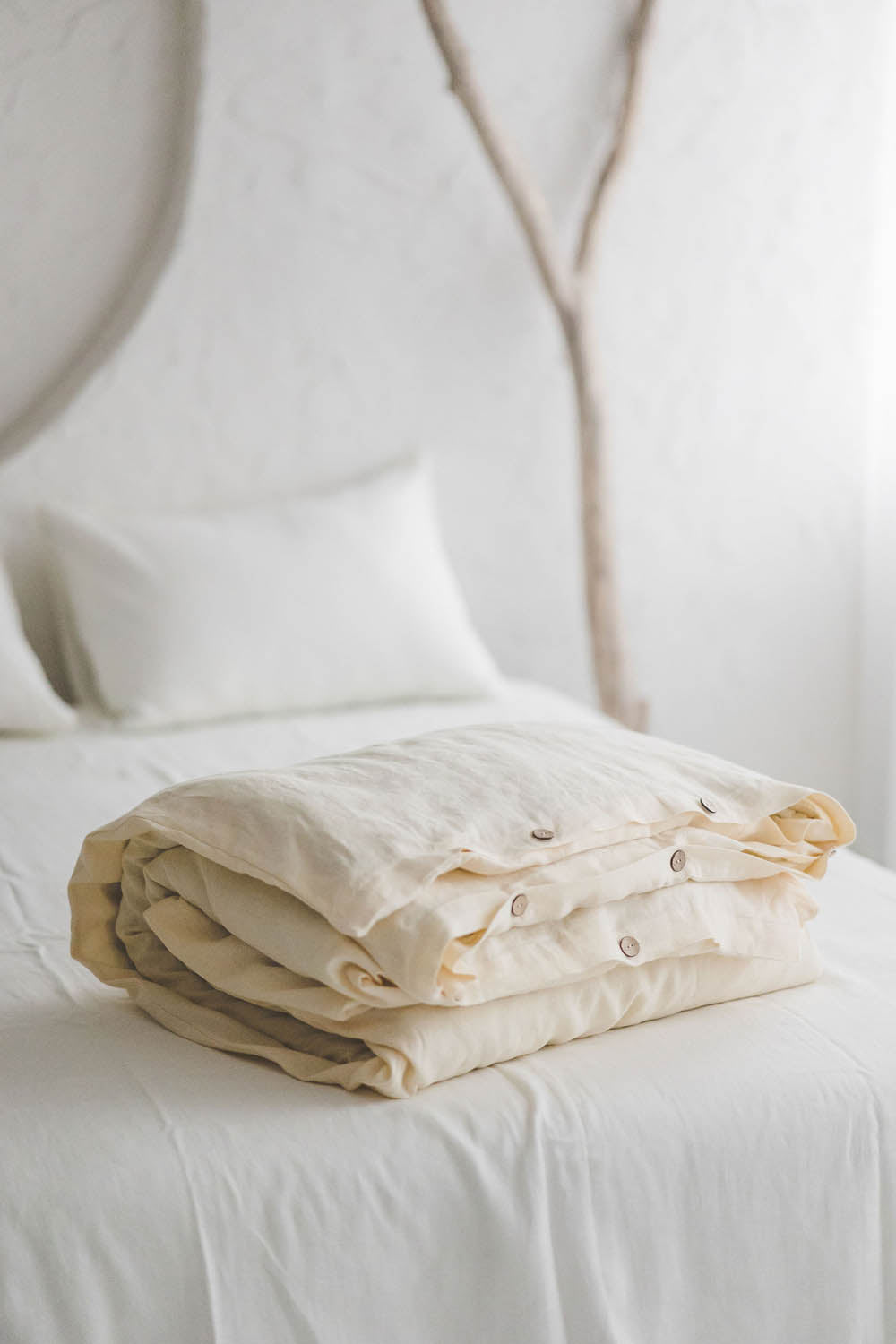 Cream linen duvet cover with buttons