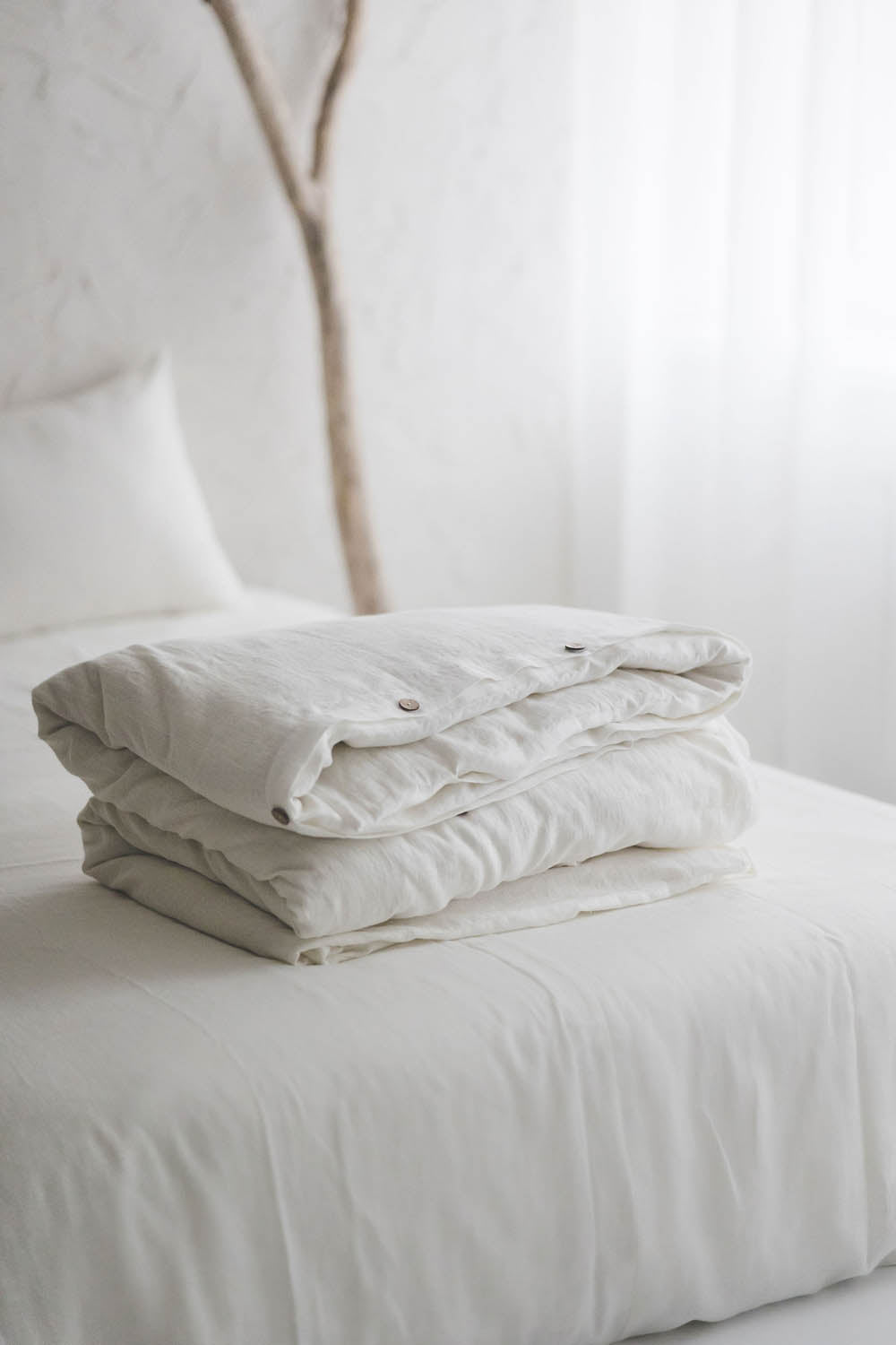 Off white linen duvet cover with buttons