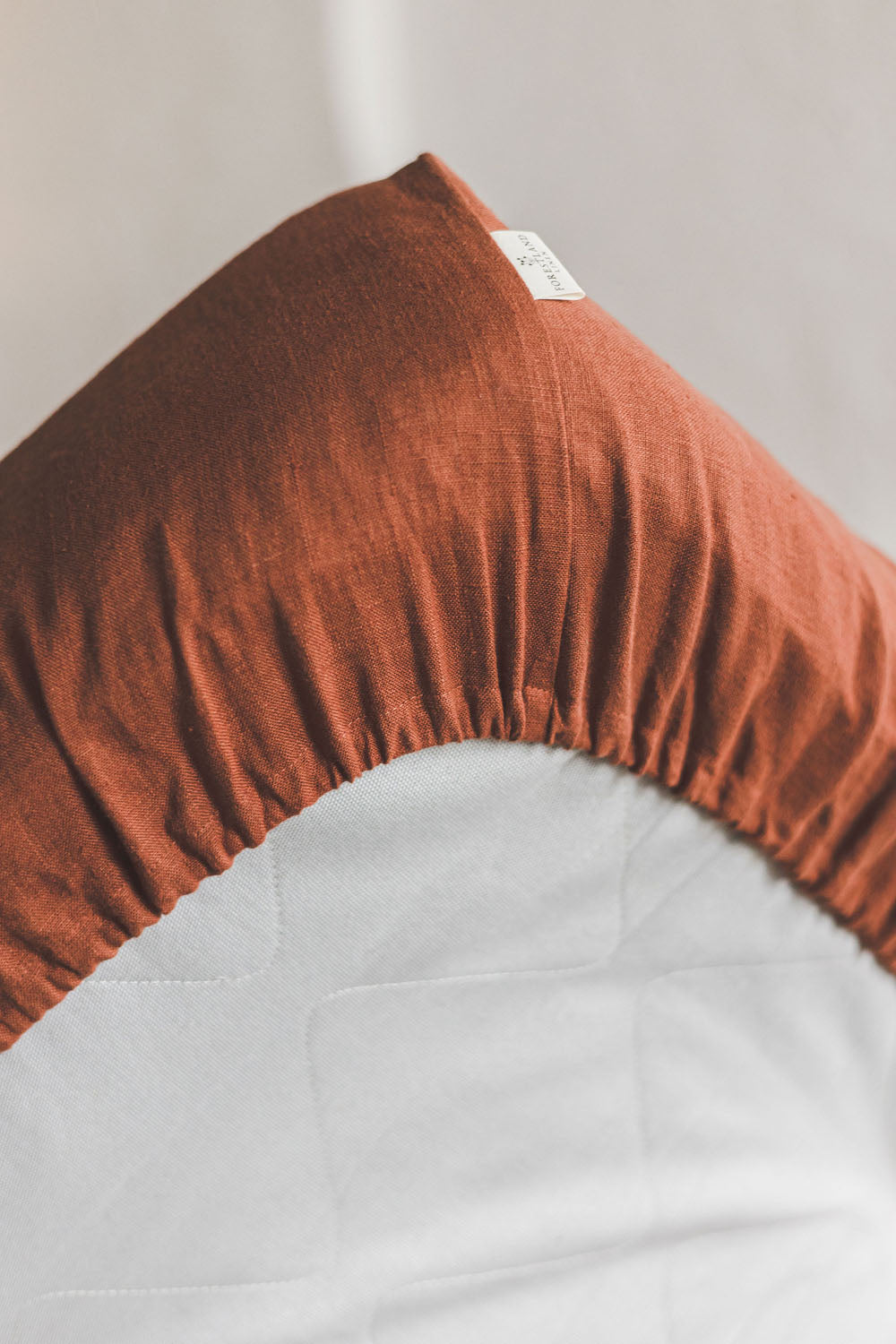 Burnt orange linen fitted sheet