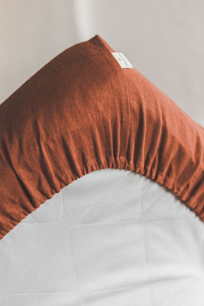 Burnt orange linen fitted sheet