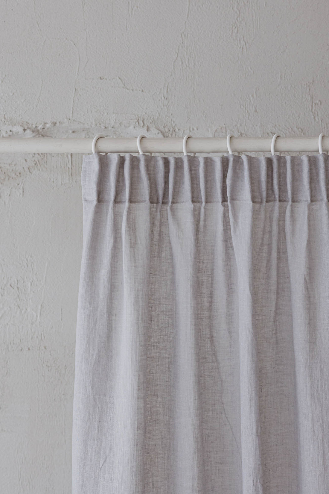 Sheer pencil pleat linen curtain in rainy day