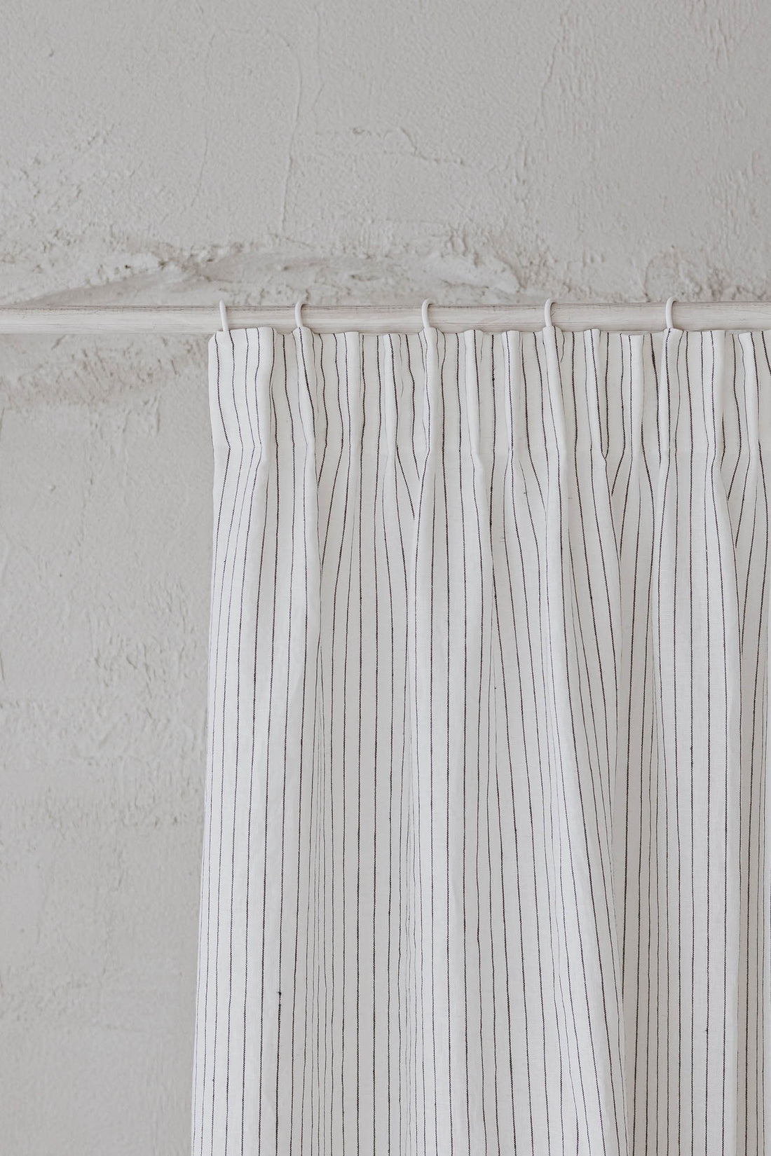 Pencil pleat linen curtain in white with black stripes