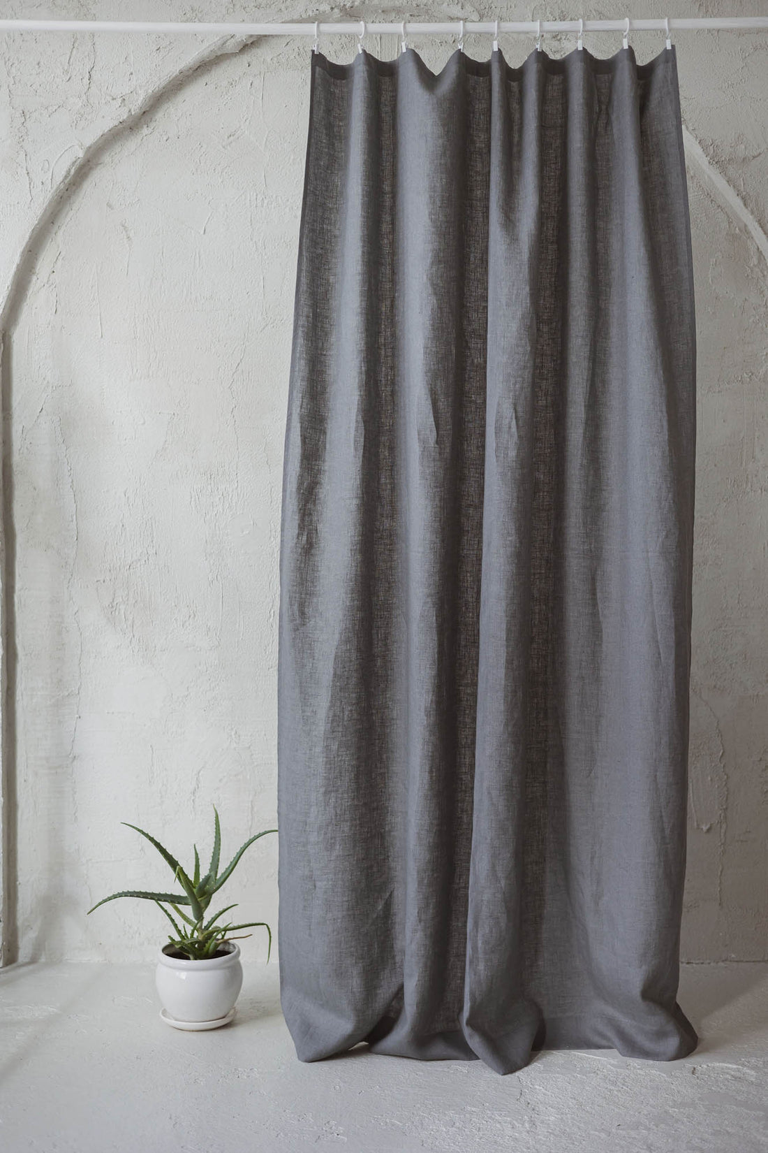Grey linen curtain with simple hem, for clips