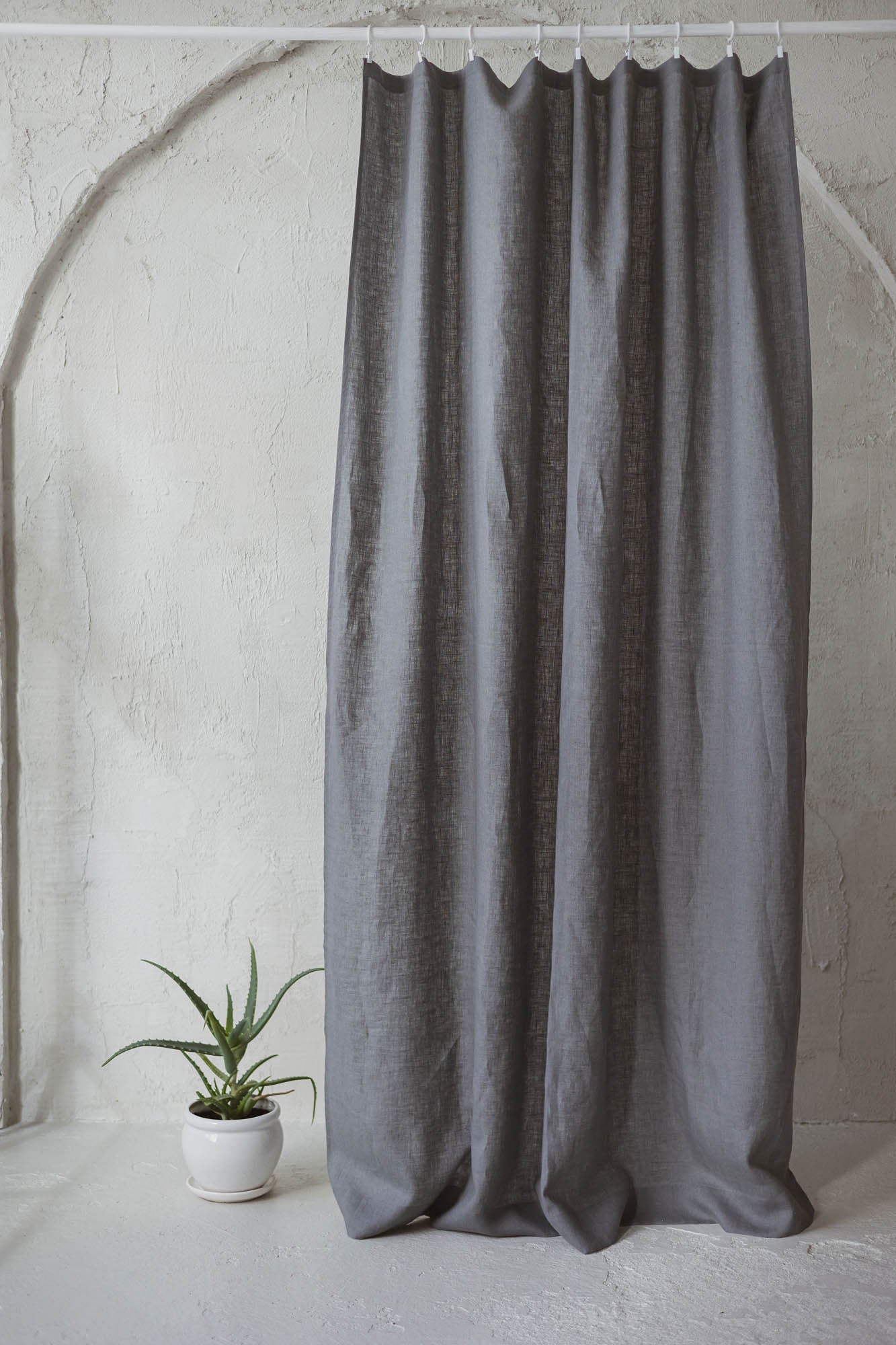 Grey linen curtain with simple hem, for clips