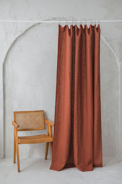 Burnt orange linen curtain with simple hem, for clips
