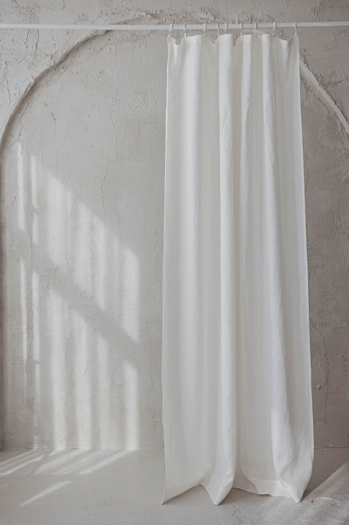 Off white linen curtain with simple hem, for clips