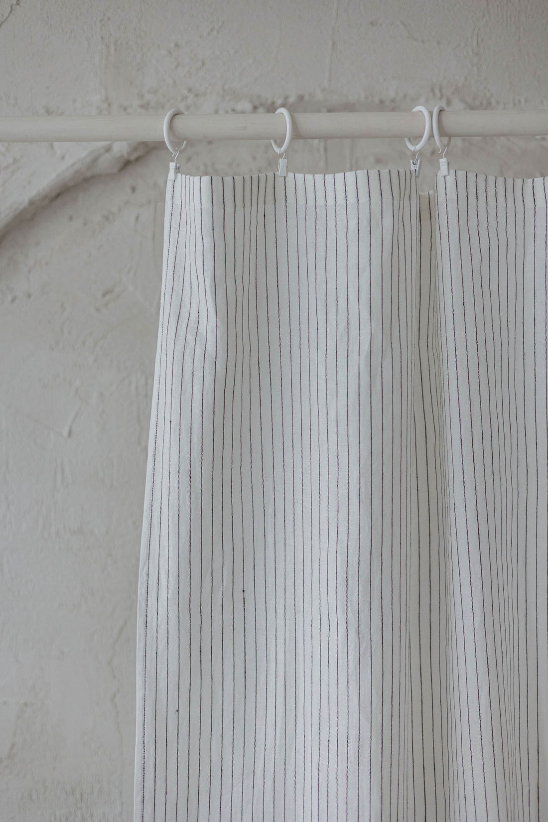 White linen curtain with black stripes and simple hem, for clips