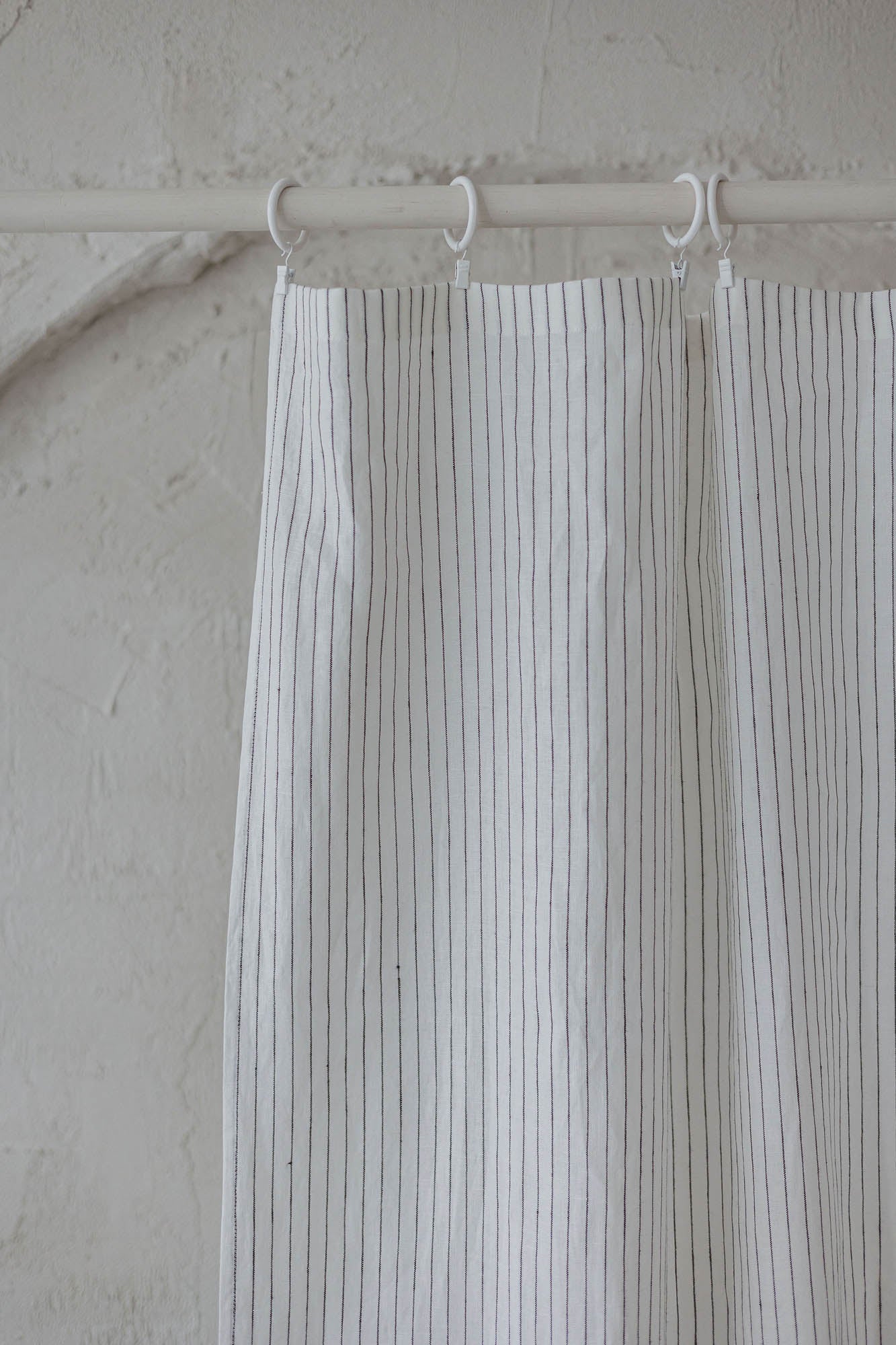 White linen curtain with black stripes and simple hem, for clips