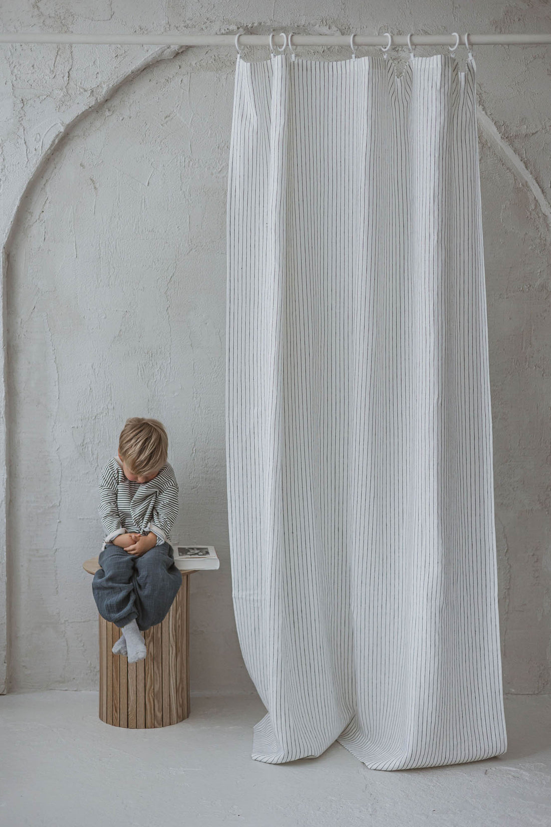White linen curtain with black stripes and simple hem, for clips