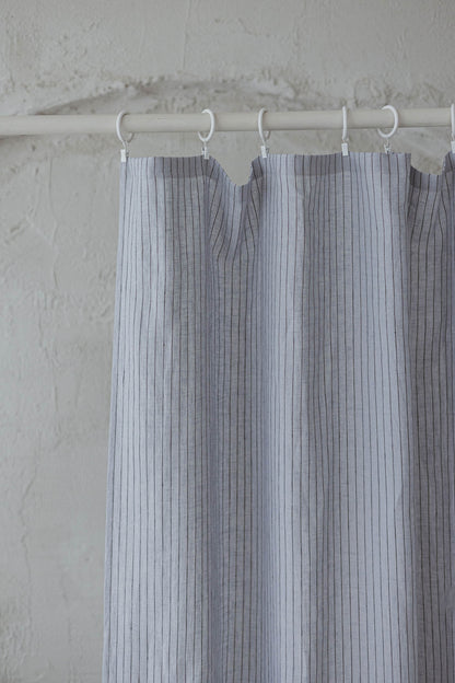 Grey linen curtain with black stripes and simple hem, for clips