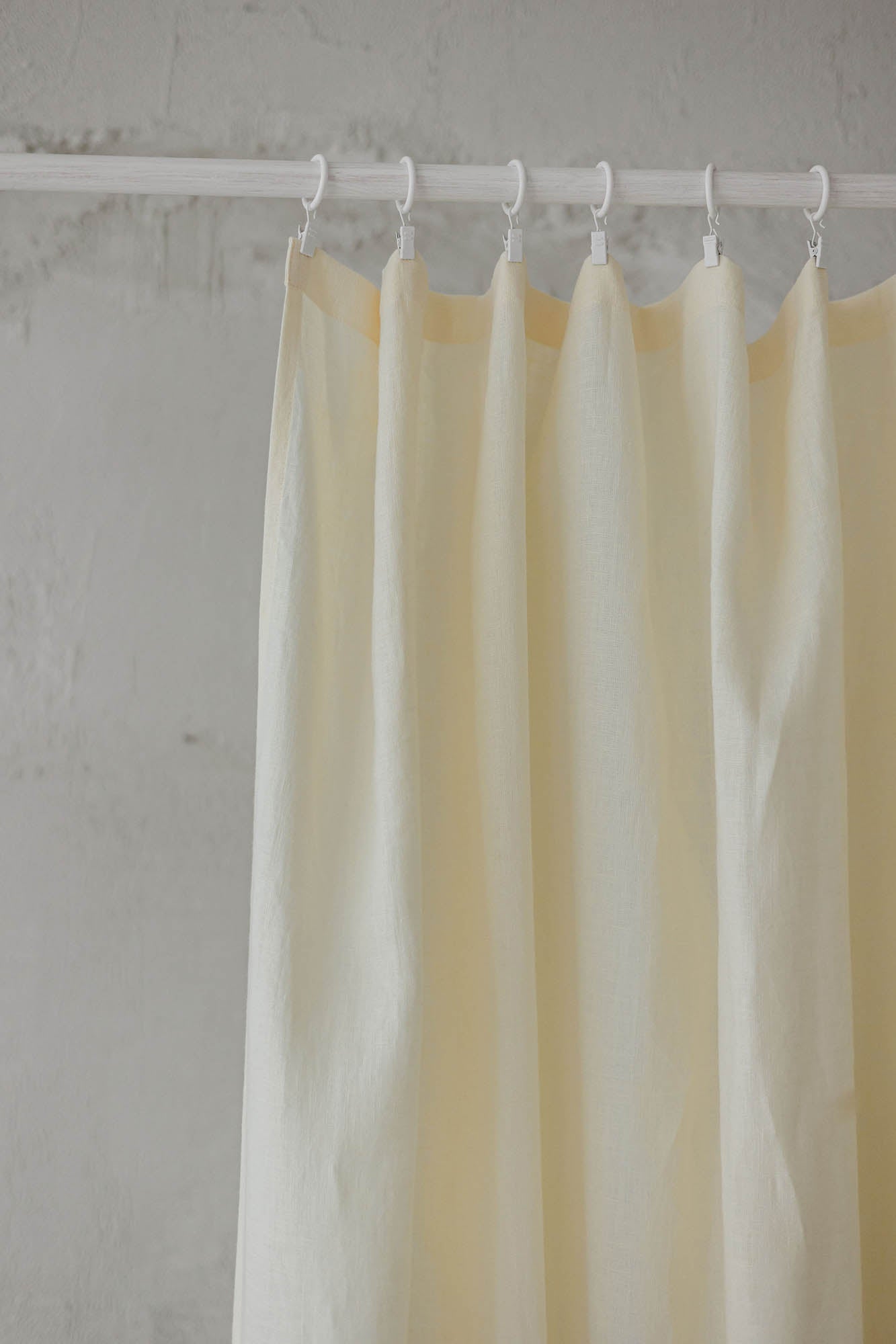 Cream linen curtain with simple hem, for clips