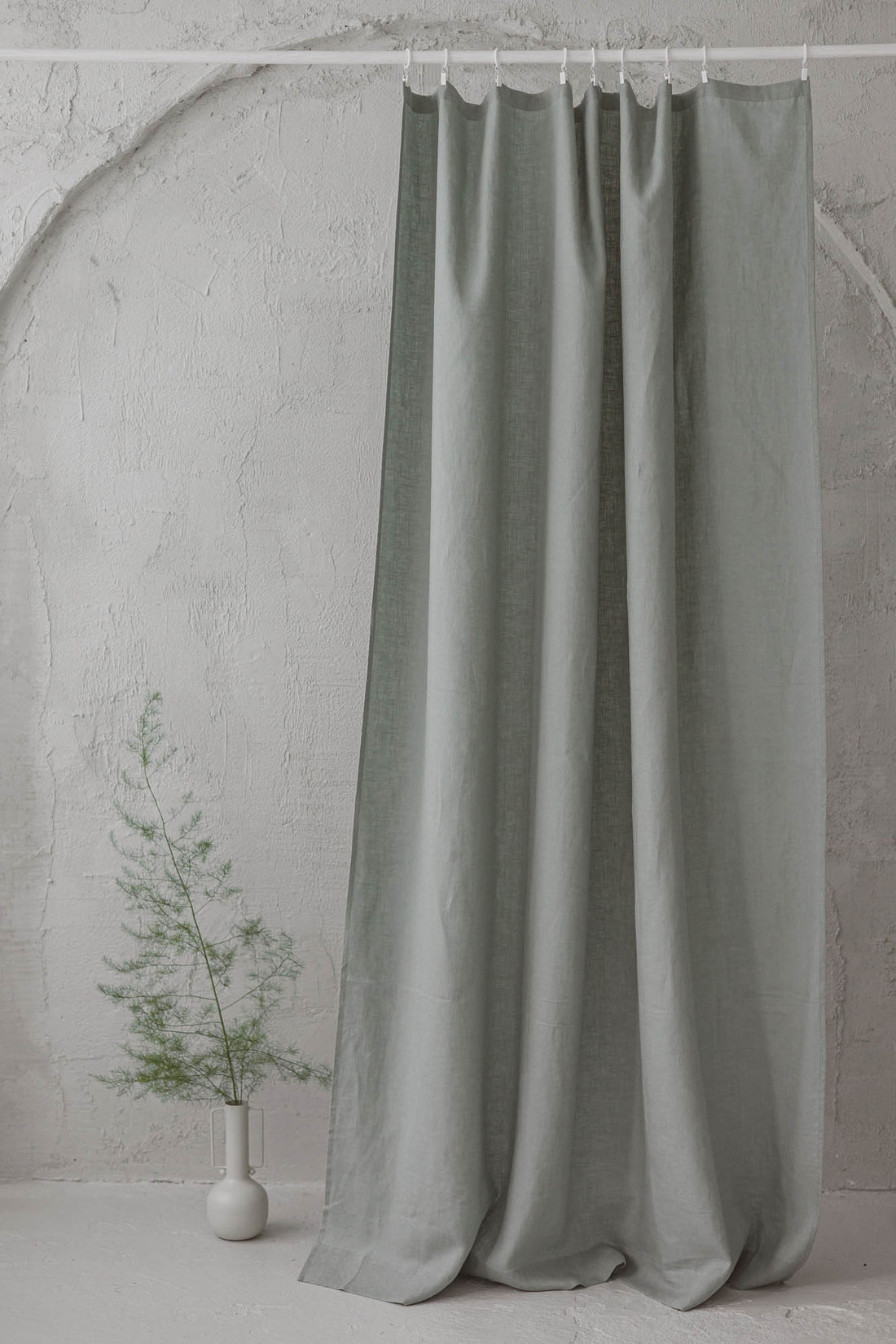 Frosty green linen curtain with simple hem, for clips