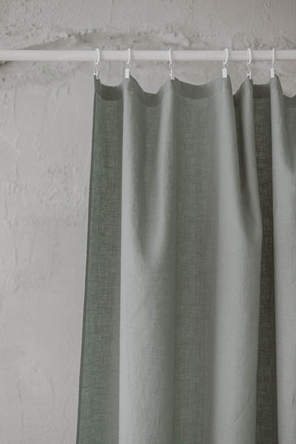 Frosty green linen curtain with simple hem, for clips