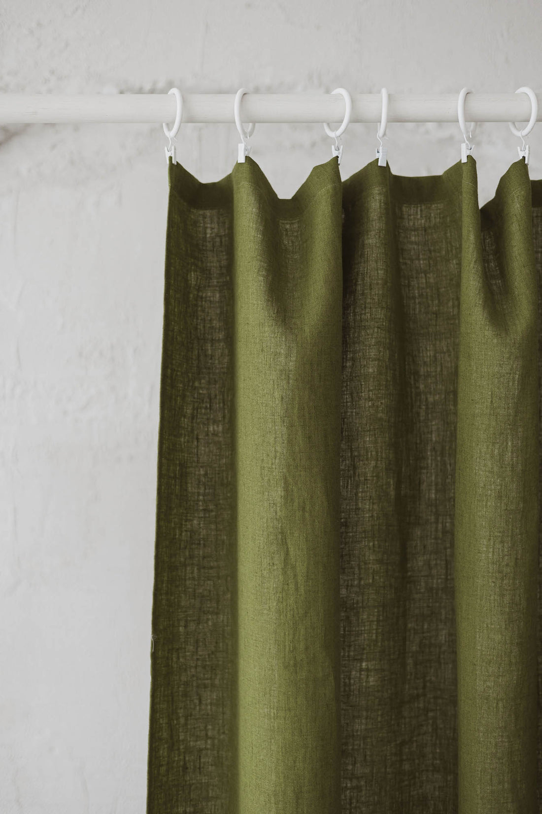 Moss green linen curtain with simple hem, for clips