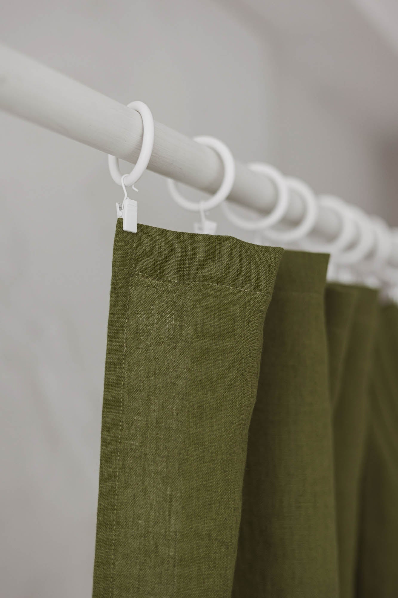 Moss green linen curtain with simple hem, for clips