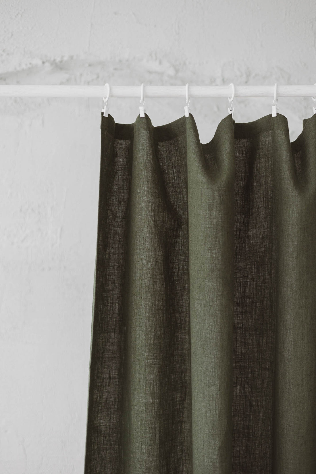 Forest green linen curtain with simple hem, for clips