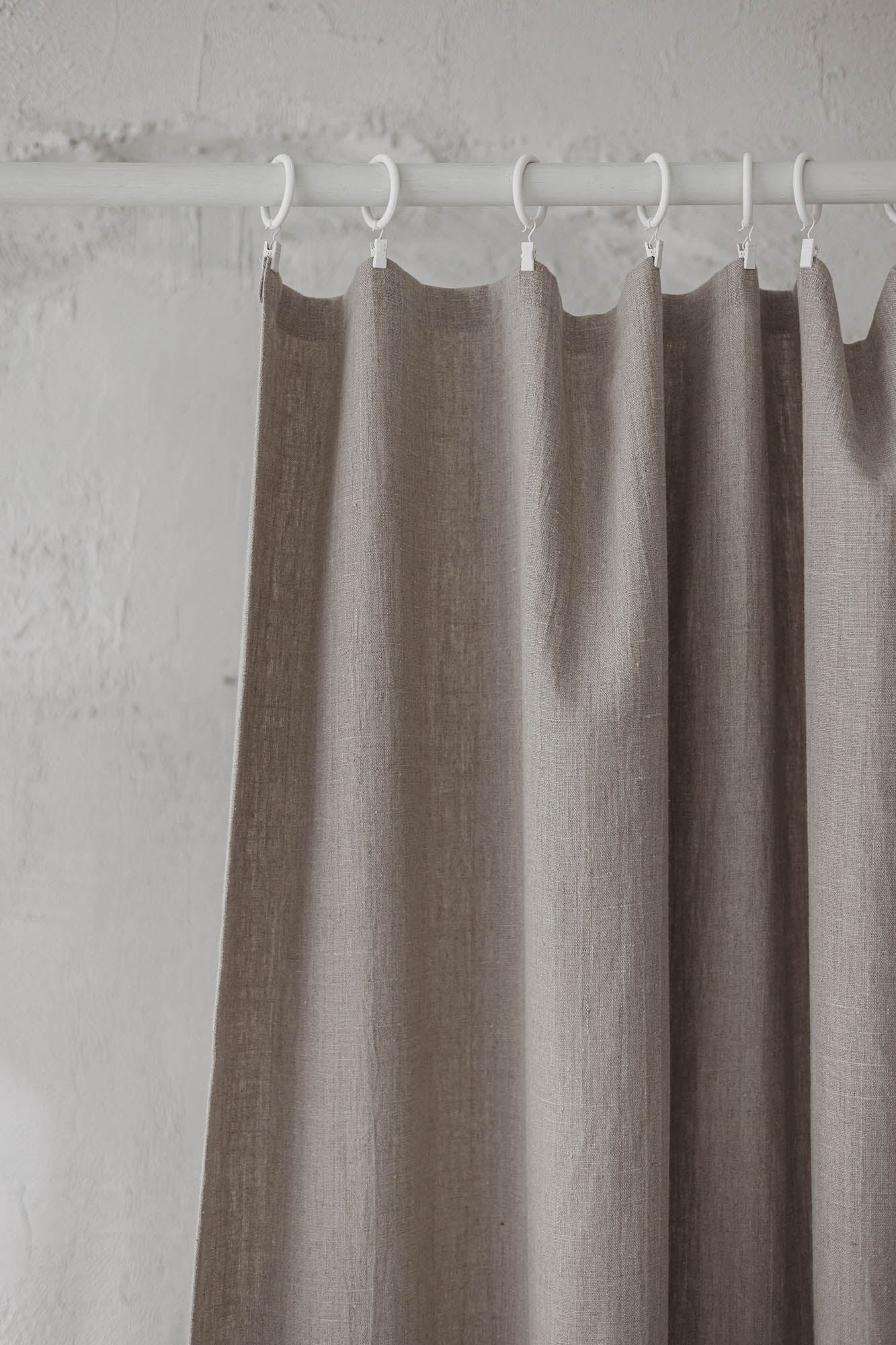 Heavyweight natural linen curtain with simple hem, for clips